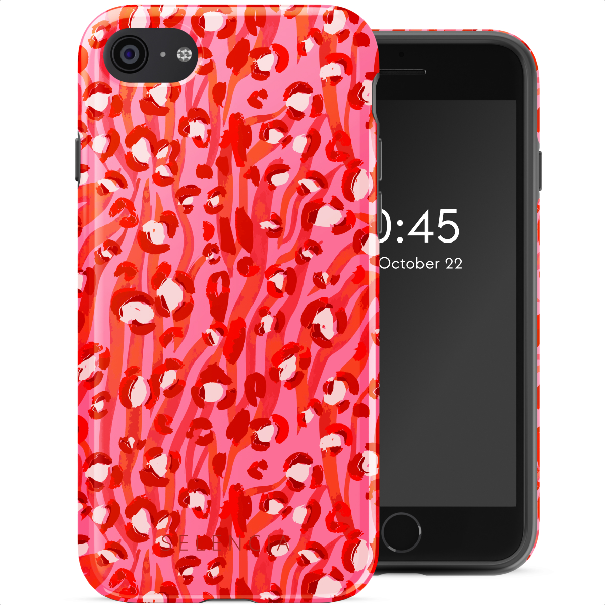 Telefoon met een roze hoes bedekt met rode en witte abstracte bloempatronen.