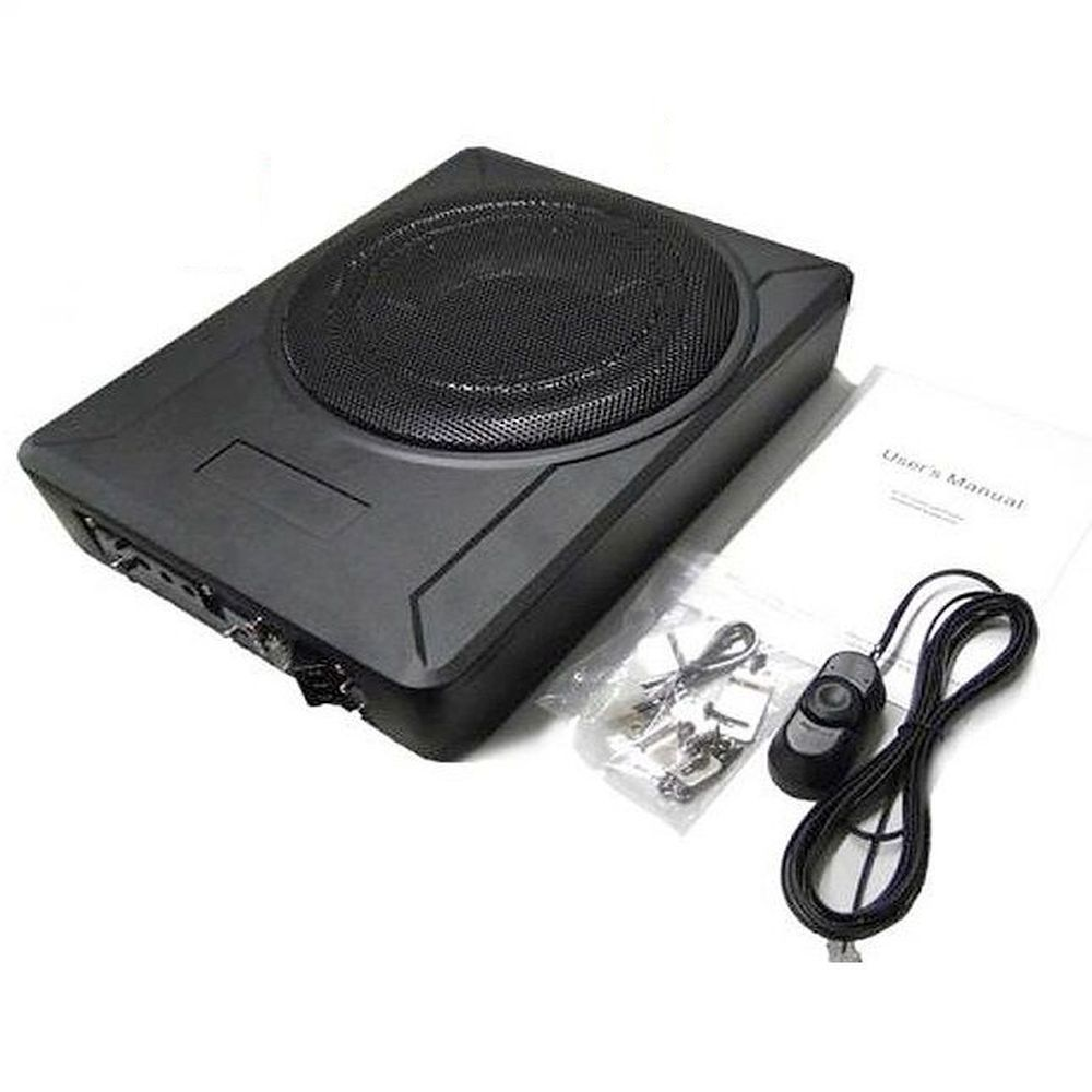 Un sistema subwoofer nero con manuale utente, cavi e un'unità di controllo.