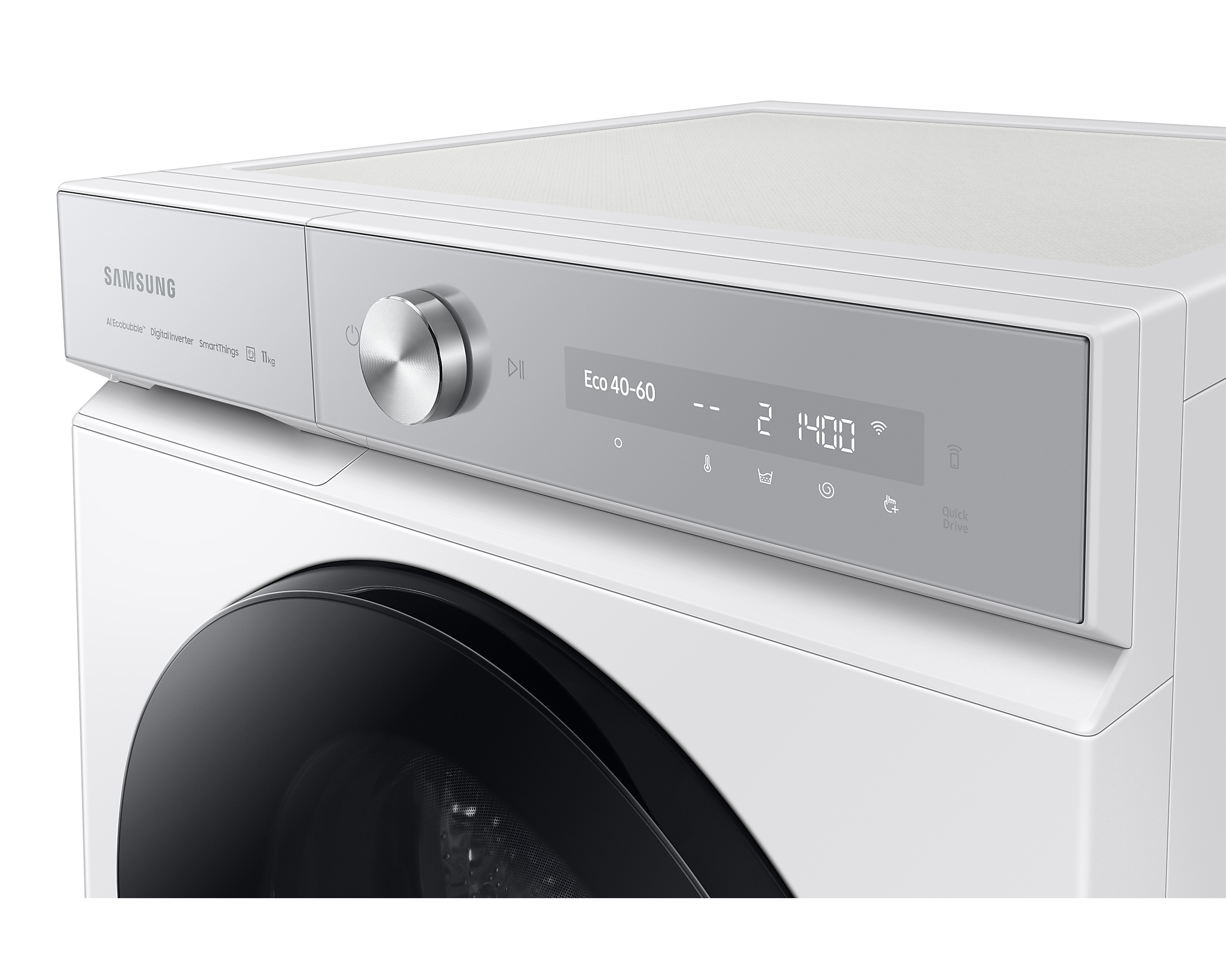 Close-up van het bedieningspaneel van een witte wasmachine met een ronde knop en display.