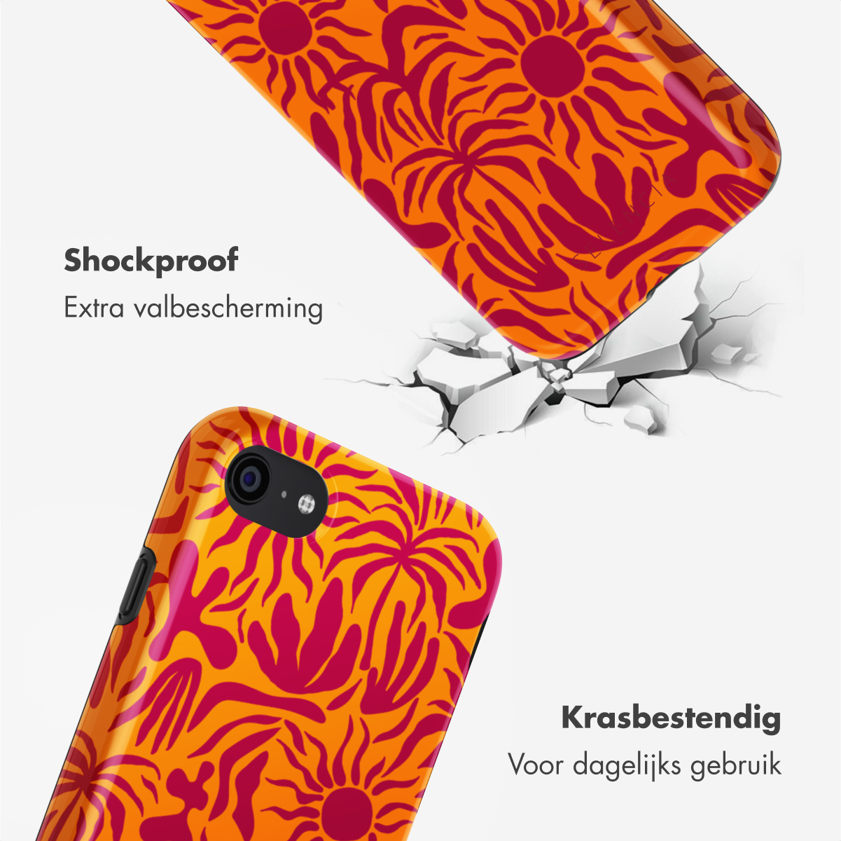 Oranje telefoonhoesje met een roze bloemenontwerp, met een gebarsten oppervlak en tekst over schokbestendig.