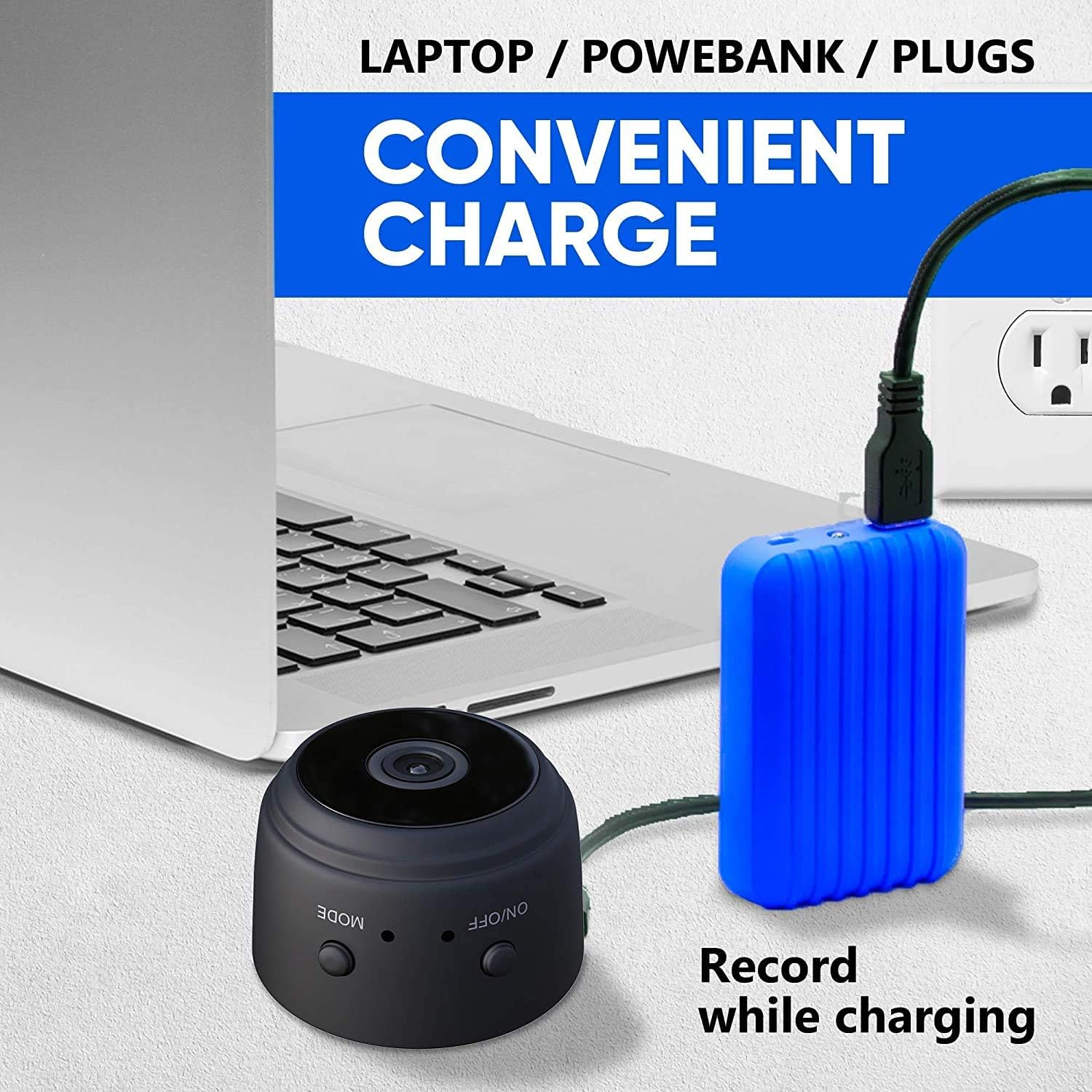 Eine schwarze Kamera ist mit einer blauen Powerbank verbunden, die an eine Steckdose angeschlossen ist. Ein Laptop in der Nähe.