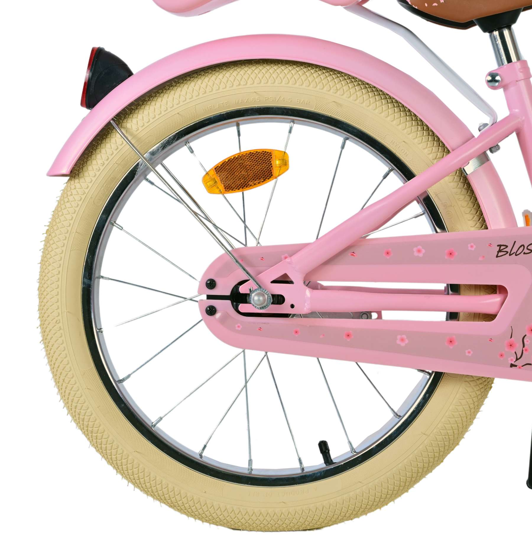Rosa Fahrradrad mit weißem Reifen, Teil eines rosa Fahrradrahmens.