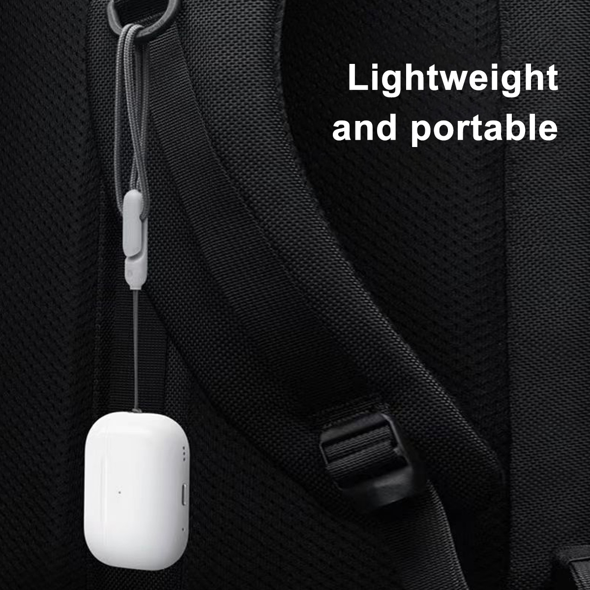Weißes tragbares Gerät an einem schwarzen Rucksack, Text: leicht und tragbar.