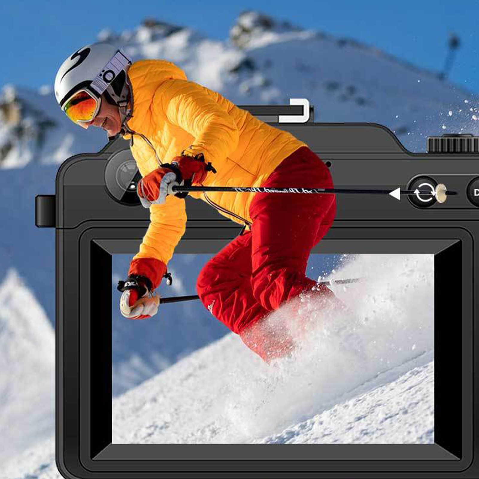 Ein Skifahrer in gelber Jacke und roter Hose fährt einen schneebedeckten Berg hinunter, gesehen durch einen Kamerarahmen.