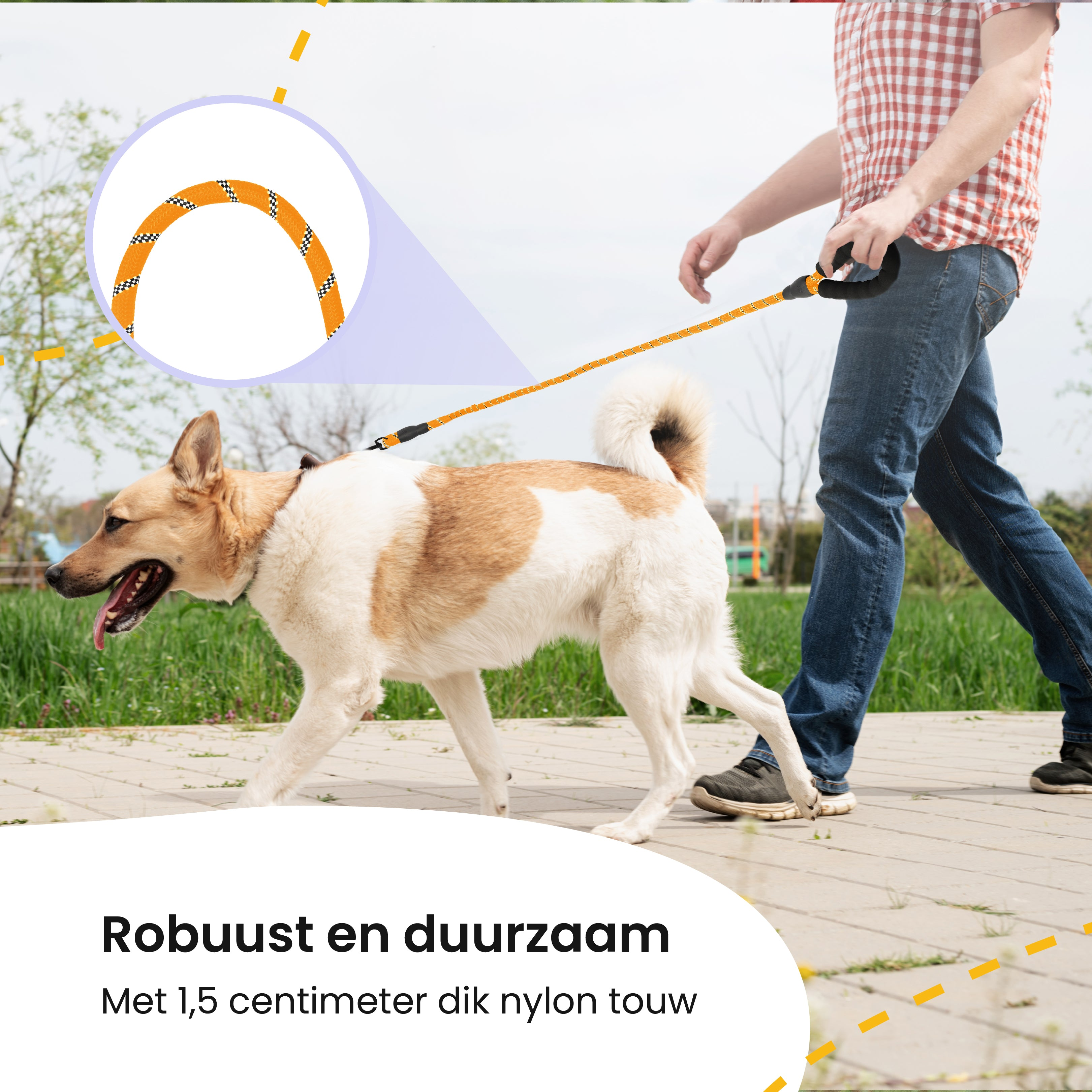 A man walks a dog on a leash in an outdoor setting.