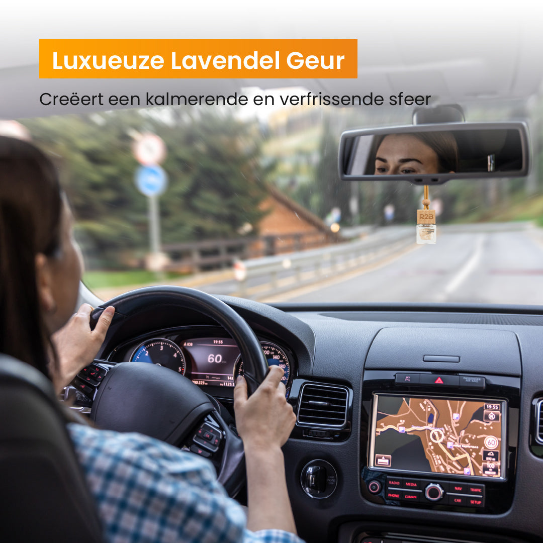 A woman driving car, dashboard visible, with lavender scent advert.
