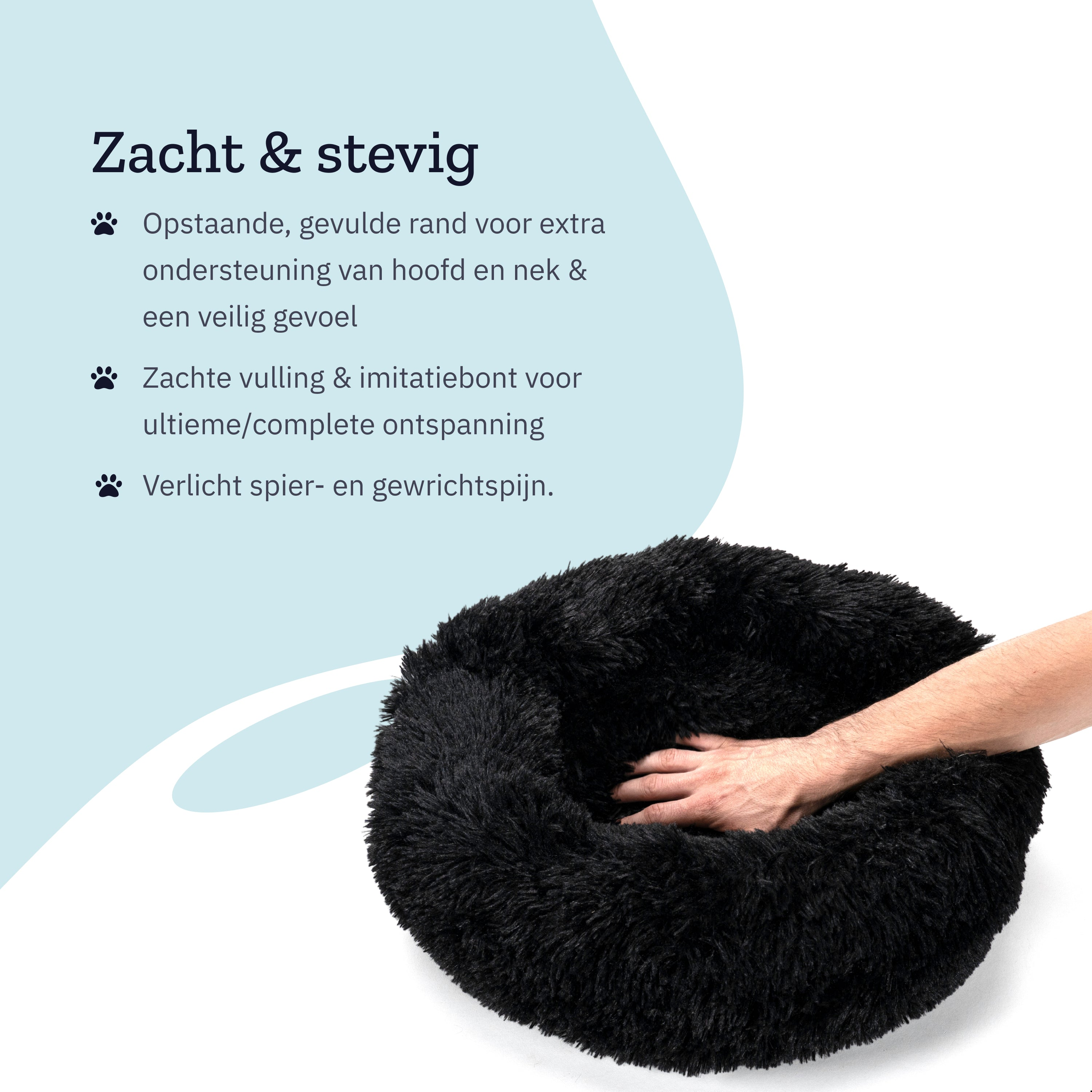 A black fluffy dog bed with a hand touching it and text.