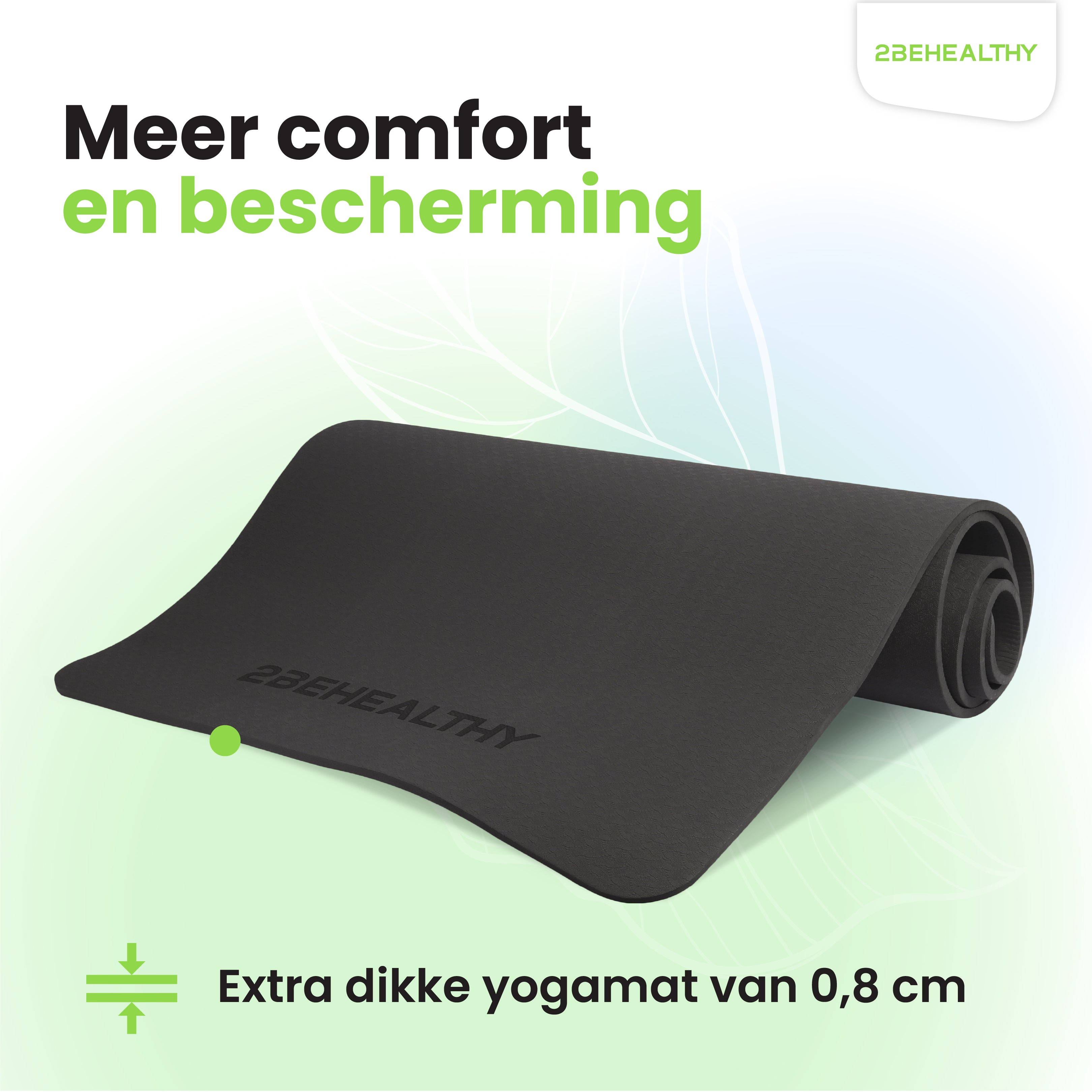Zwarte yogamat opgerold. Groen accent linksonder.