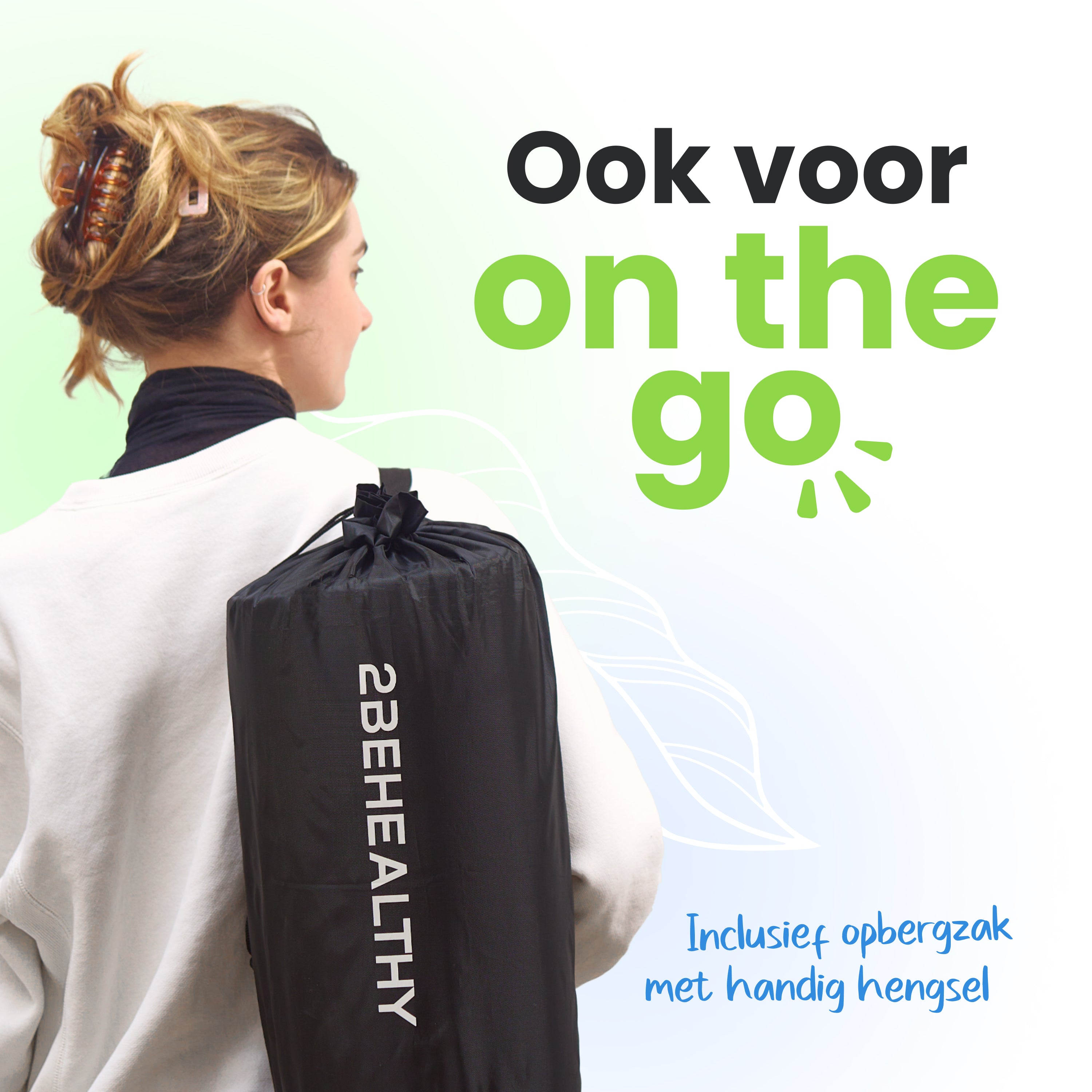 Woman walking with a black yoga mat bag over her shoulder. Text '2BEHEALTHY'.