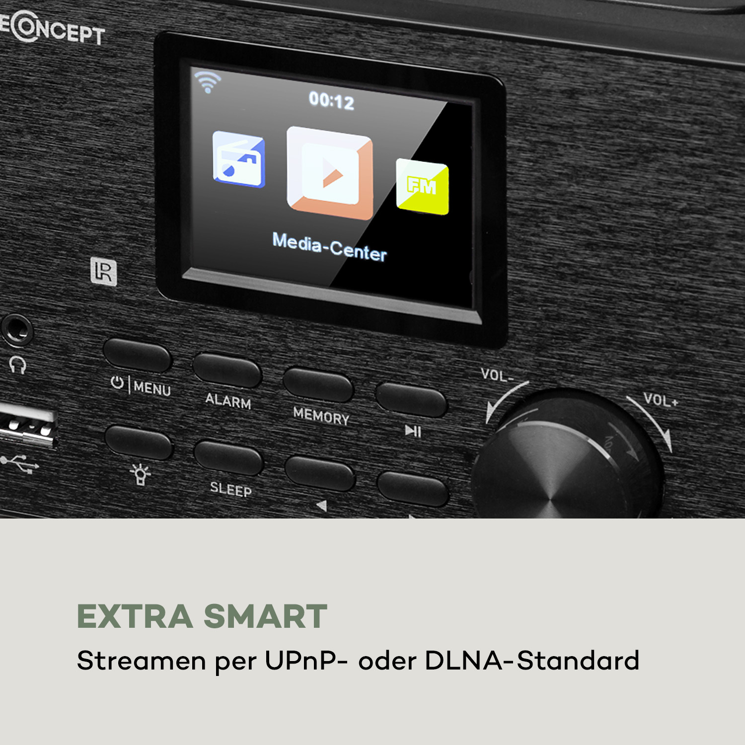 Nahaufnahme des Bedienfelds eines schwarzen Audiosystems mit Bildschirm, der Symbole zeigt. Knöpfe für Menü, Alarm usw.