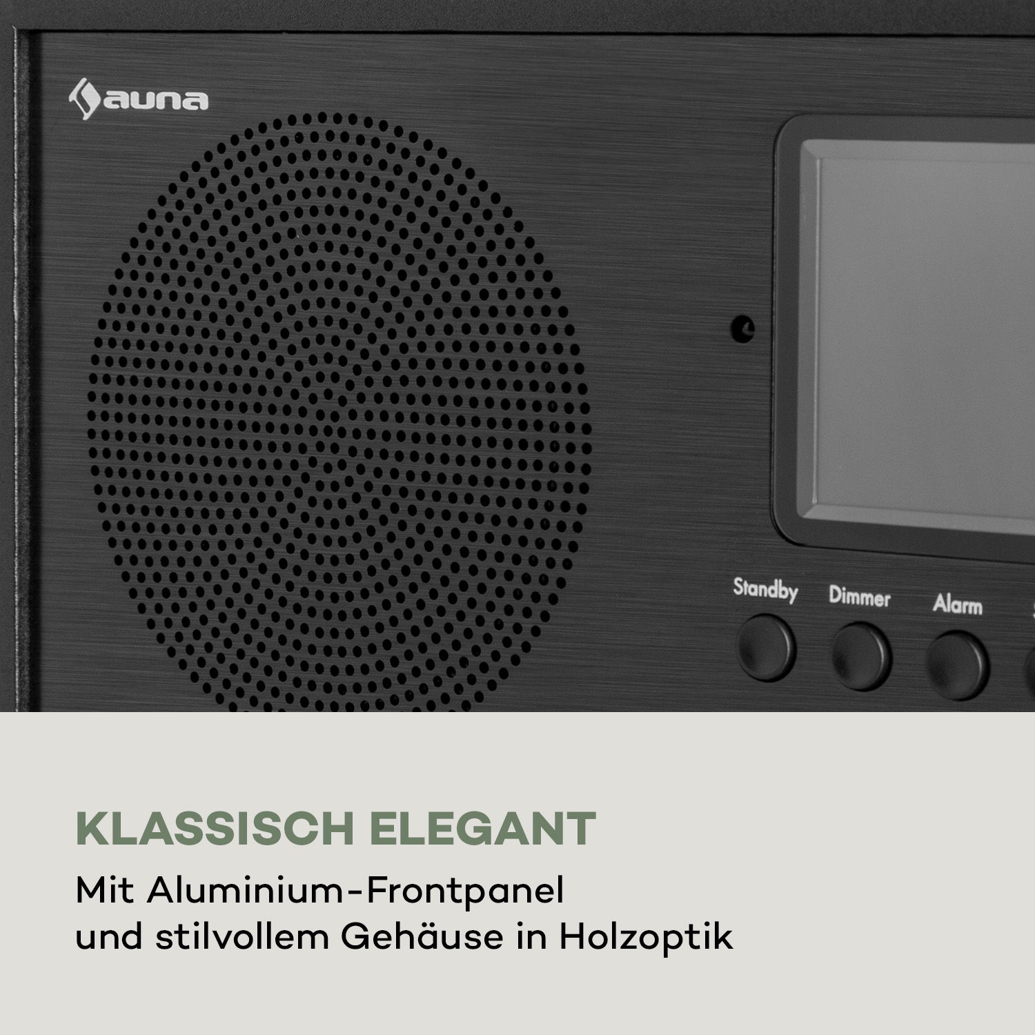 Schwarze Stereoanlage mit rundem Lautsprecher, einem Display und drei Knöpfen. Text lautet 'auna'.
