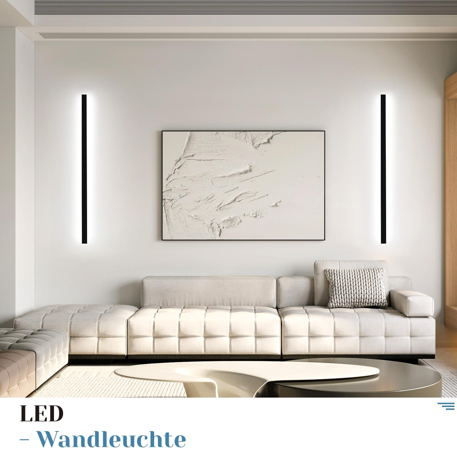 Soggiorno moderno con luci a parete a LED, divano e un dipinto sul muro.
