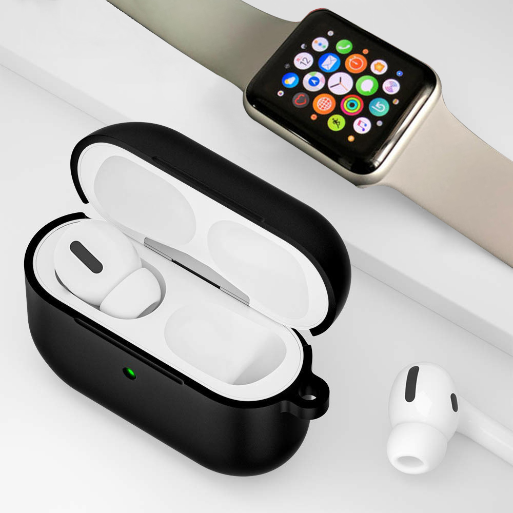 Schwarzes AirPods-Case und weiße AirPods neben einer Apple Watch. Case ist offen, AirPods drin.