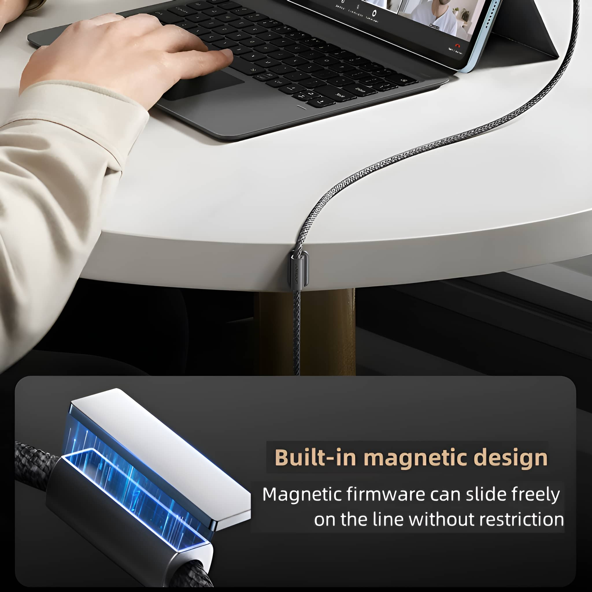 Ein Laptop mit einem magnetischen Kabel, das mit einem Tisch verbunden ist, mit magnetischem Design.