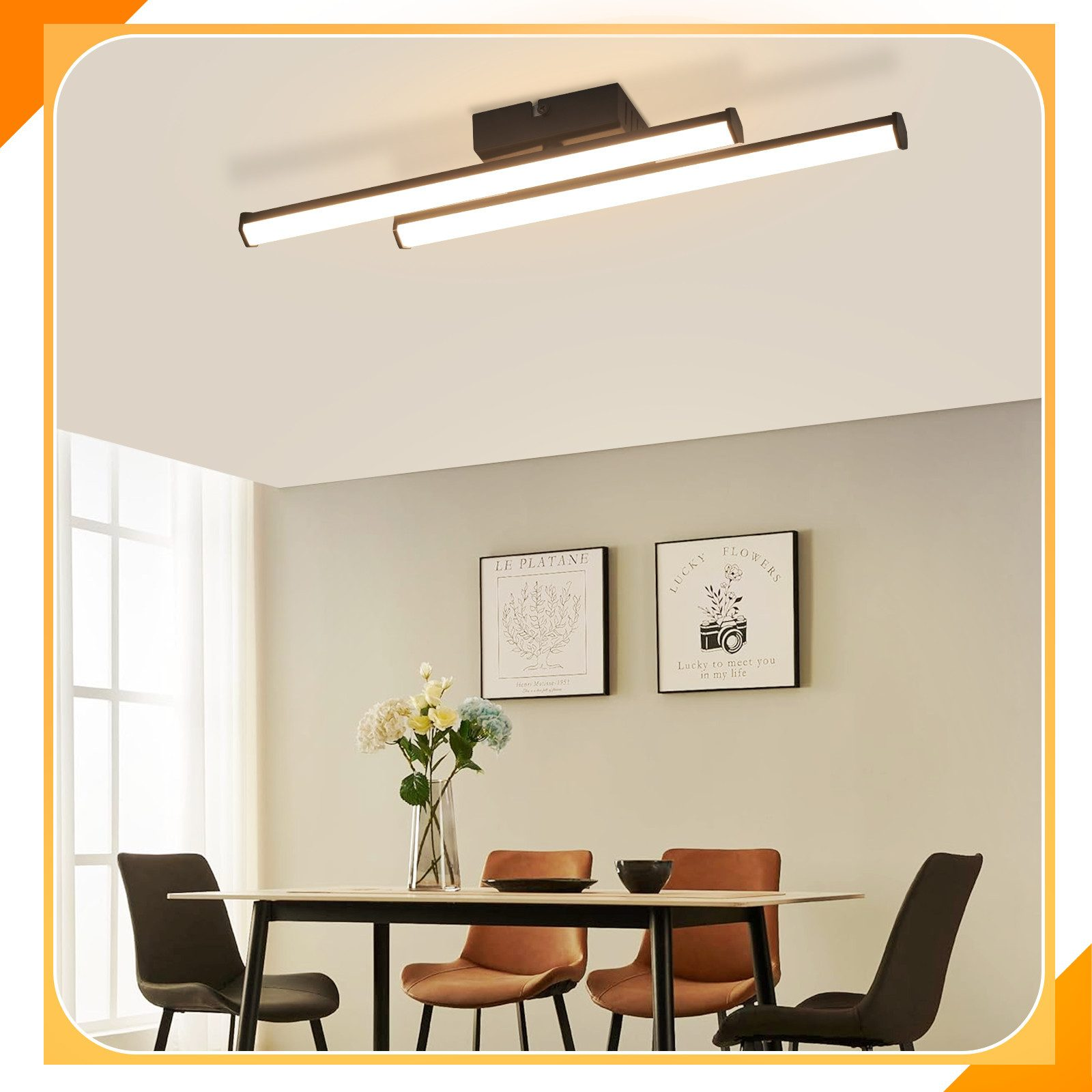 Nowoczesna jadalnia z długim stołem, krzesłami, sztuką na ścianie i lampą sufitową.