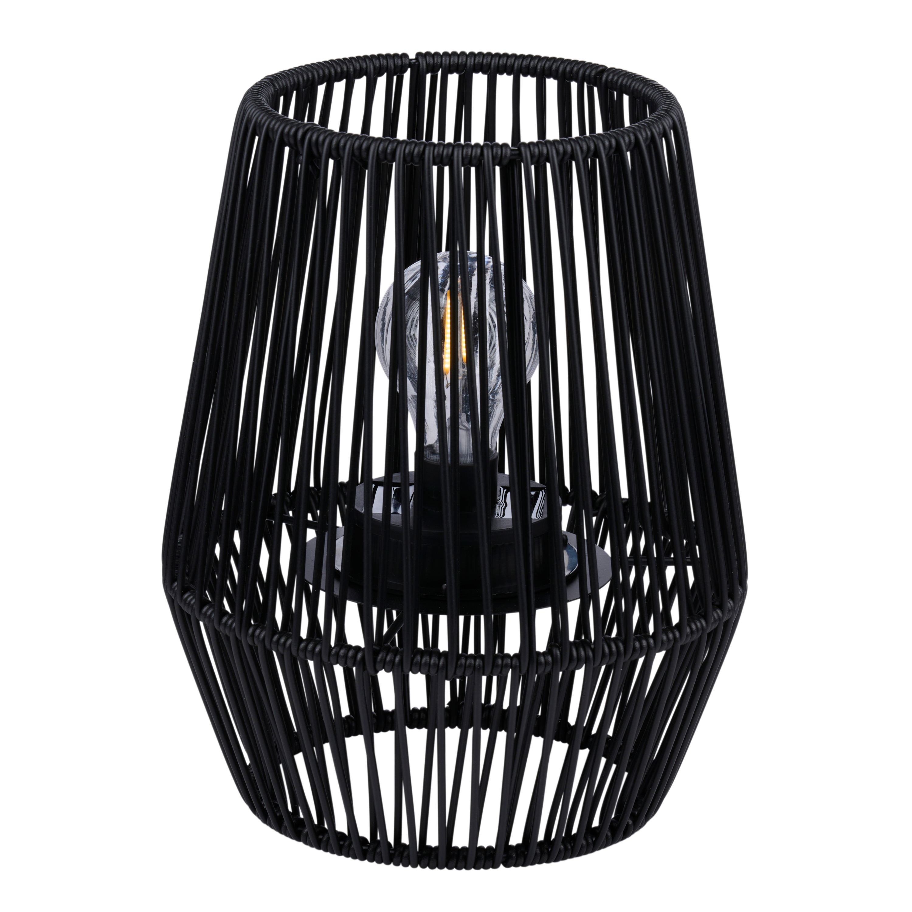 Black, woven lamp with a lightbulb inside. The lamp is on a white background.