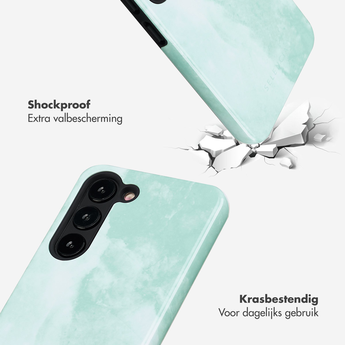 Una custodia per telefono verde menta con effetto marmorizzato. La custodia è incrinata come se fosse caduta.