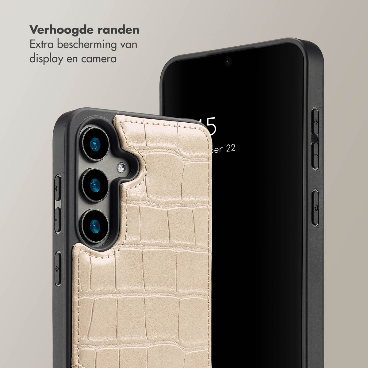 Telefoon met een hoesje, met een krokodillenpatroon. De hoes is beige en de telefoon heeft knoppen.