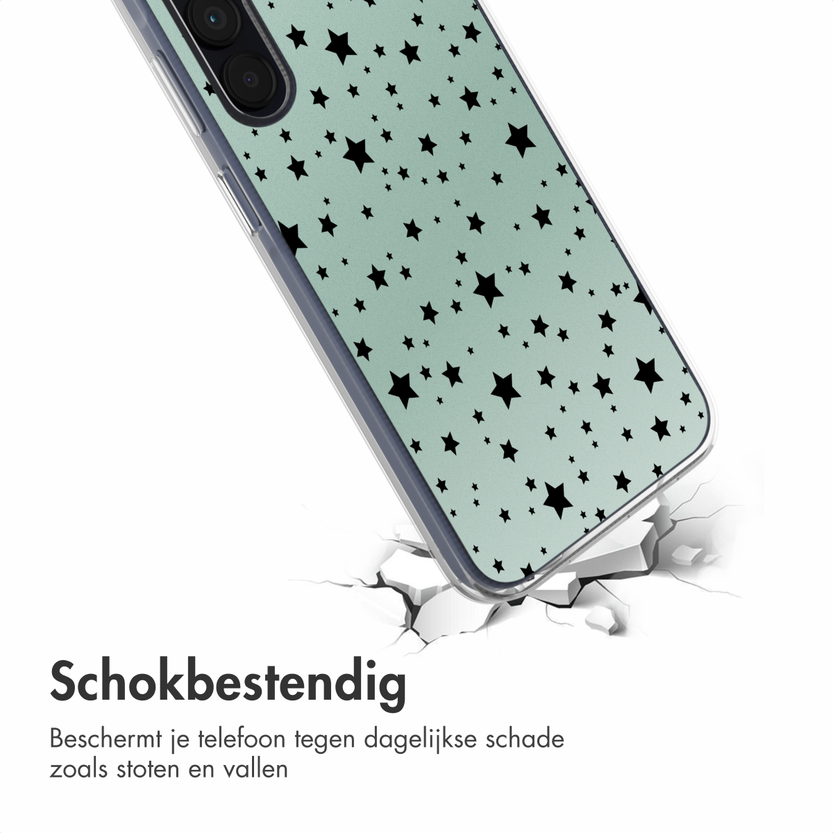 Un téléphone dans un étui avec des étoiles noires sur fond vert est fissuré en dessous.