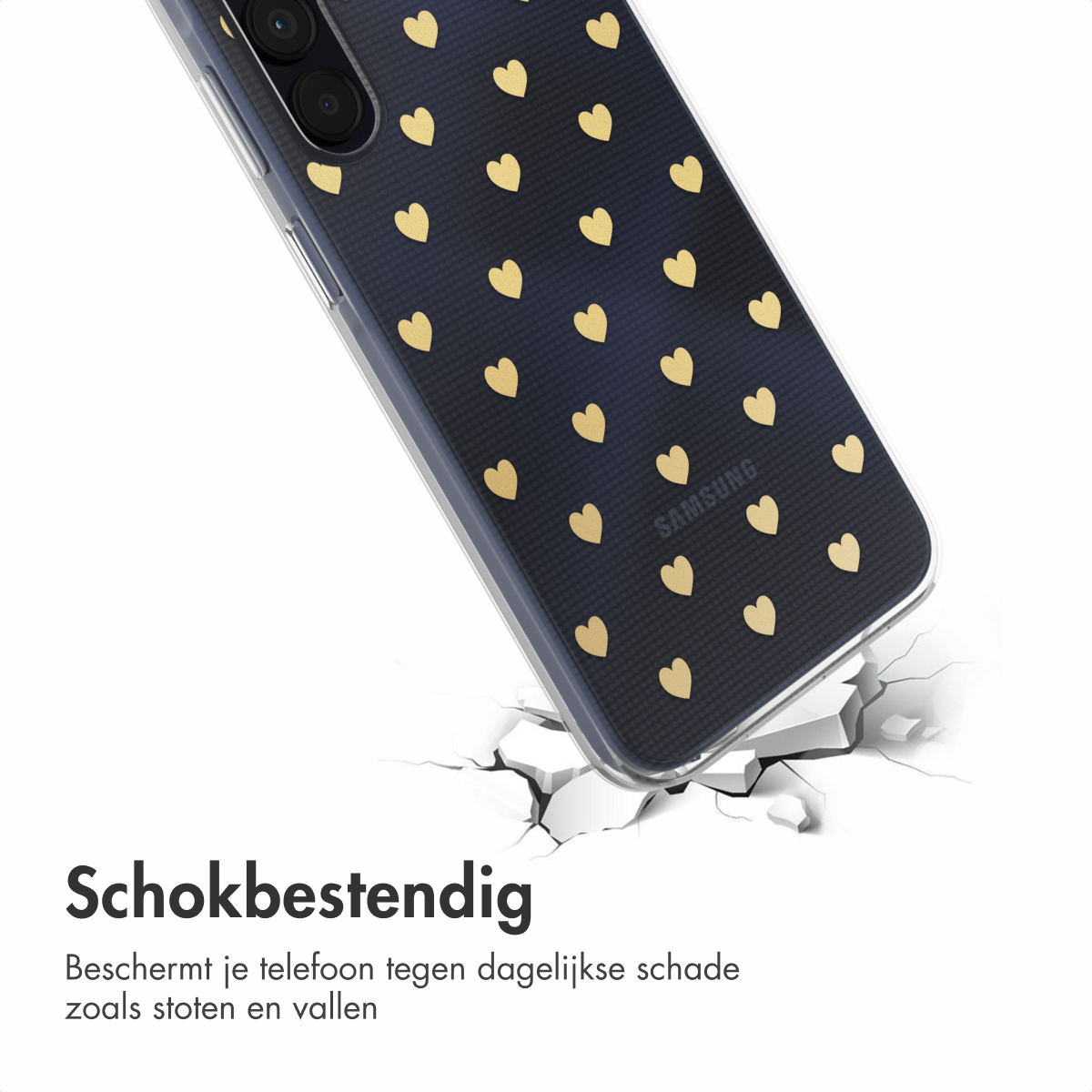 Coque de téléphone noire avec motif de cœur doré. Le téléphone est fissuré sur le sol.