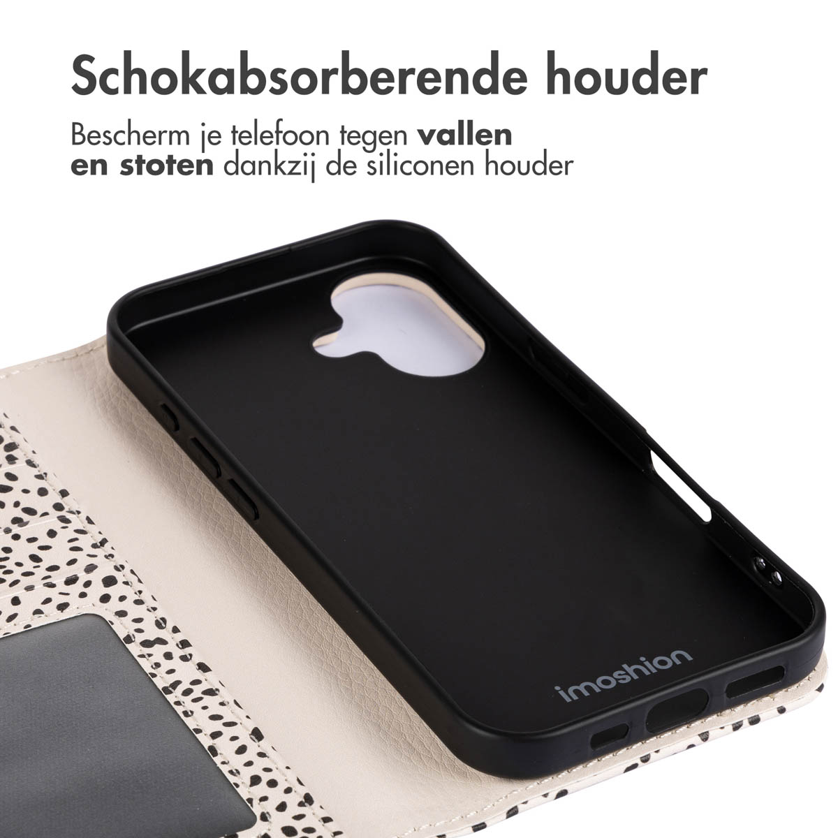 Coque de téléphone noire, ouverte, avec un téléphone noir à l'intérieur. La coque est blanche à pois noirs.
