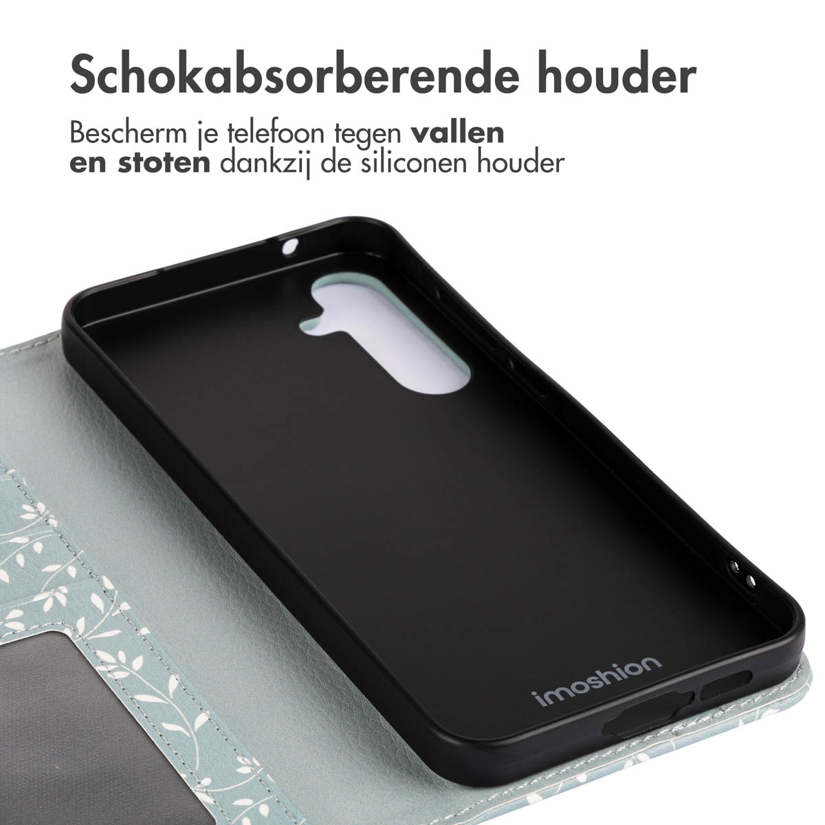 Une coque de téléphone noire. La coque est ouverte, montrant un motif floral.