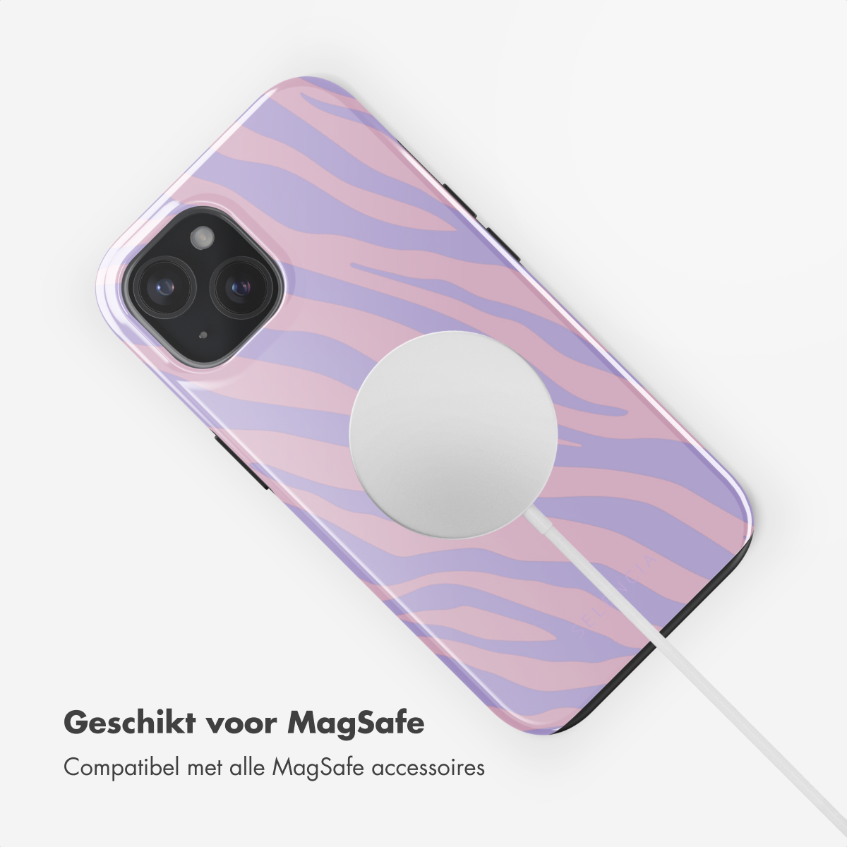 Roze en paarse zebra telefoonhoes met MagSafe, op een wit oppervlak.