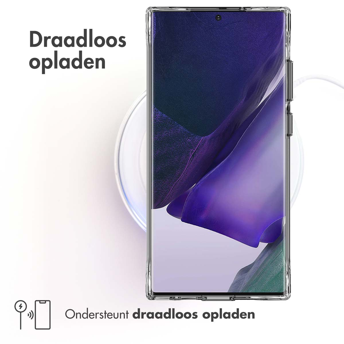 Transparante telefoonhoes op een wit oppervlak met een telefoon erin en een draadloze oplaadpad.