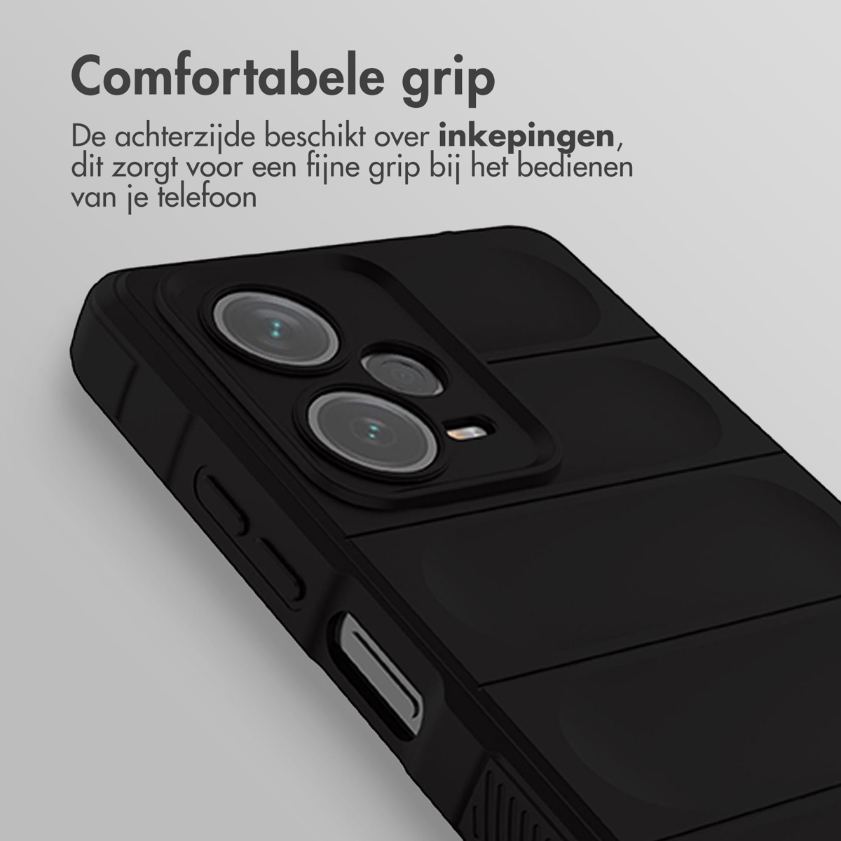 Coque de téléphone noire sur un téléphone. La coque est noire. Fond gris.