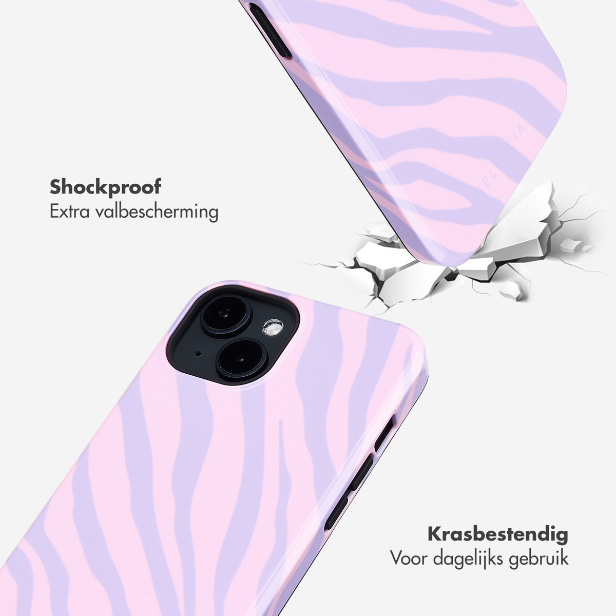 Twee telefoonhoesjes. Eén zit op een telefoon en de ander valt. Beide hebben een zebrapatroon.