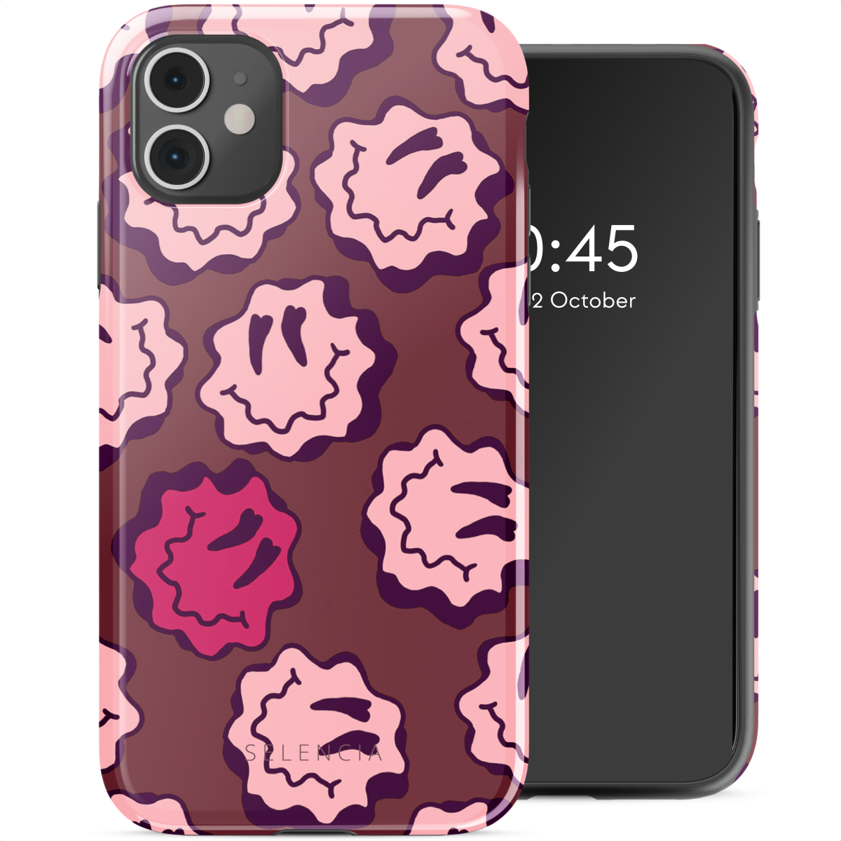 Custodia per telefono con faccine sorridenti rosa su sfondo marrone. Il telefono mostra l'ora. Sfondo bianco.