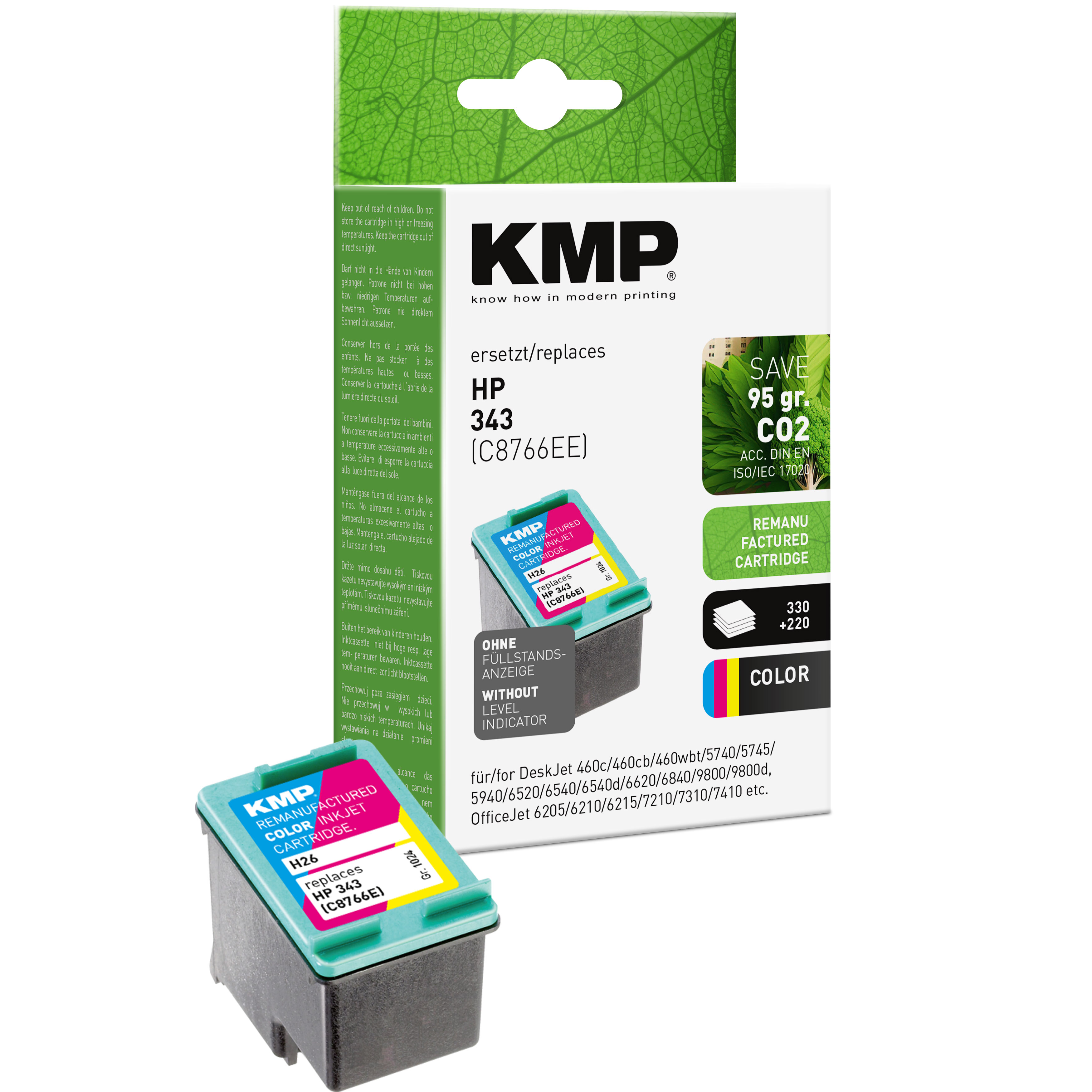 Una cartuccia d'inchiostro KMP con una foglia verde, una scatola e cartucce aggiuntive. Sfondo bianco.