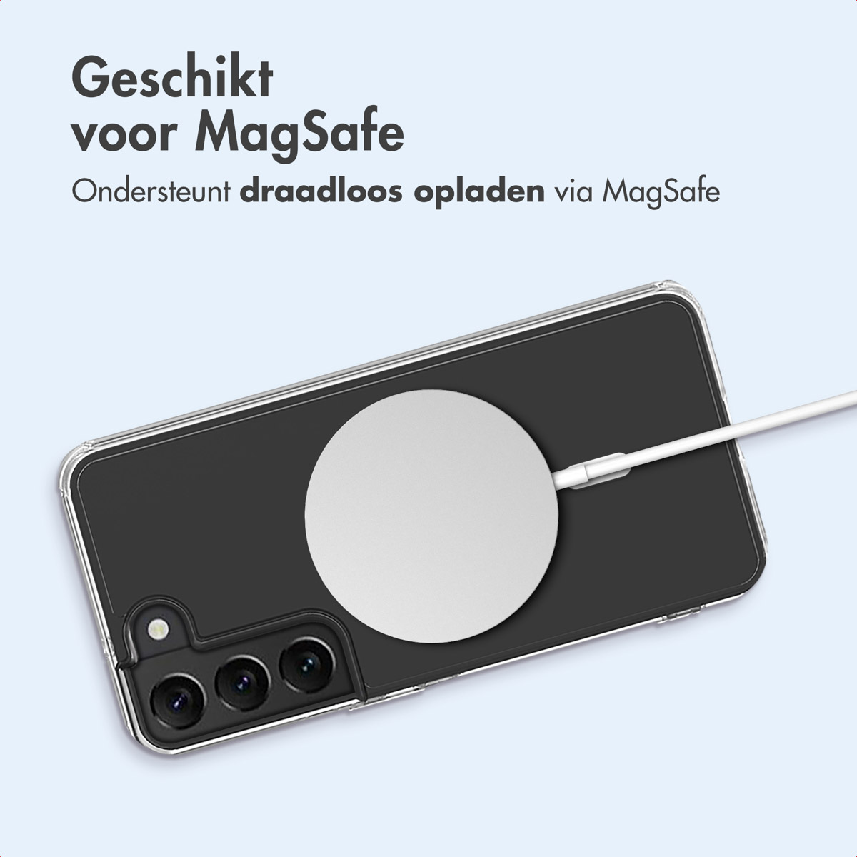 Clear phone case with a phone inside, charging wirelessly via a white circular pad.