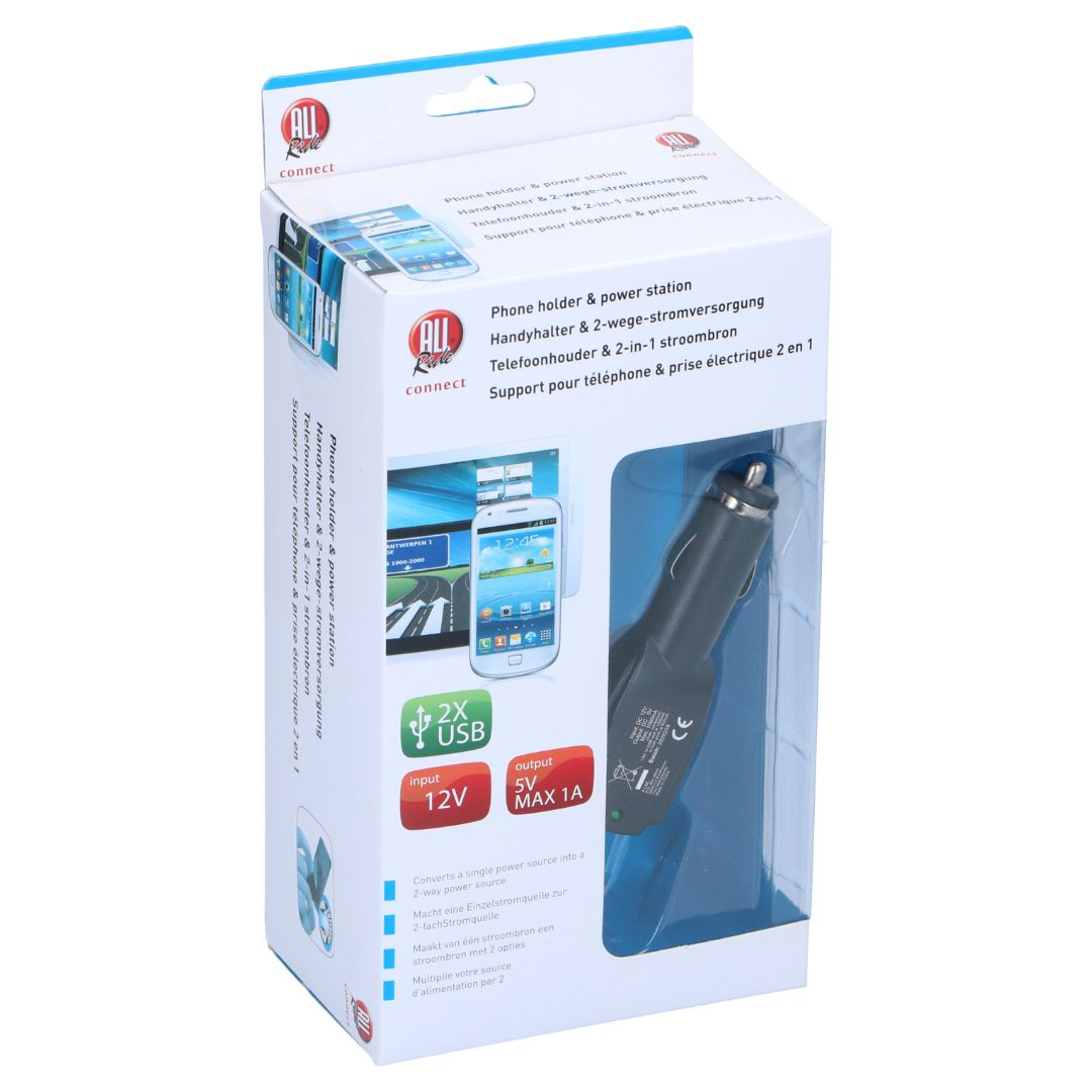 Een telefoonlader in een doos met tekst. De lader is zwart en heeft een USB-poort.