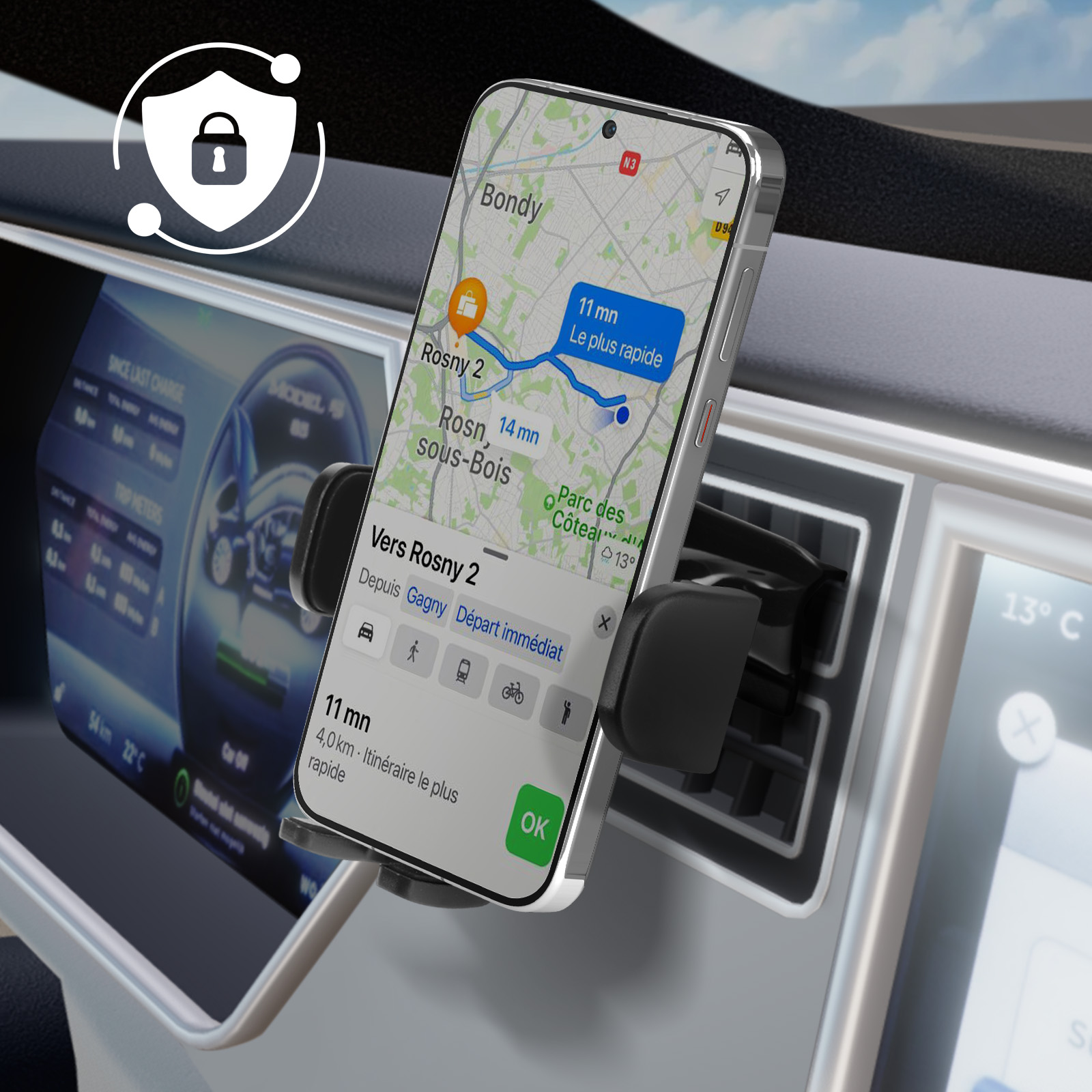 Un teléfono en un soporte para automóvil muestra una aplicación de navegación con una ruta, con un icono de escudo en la esquina.