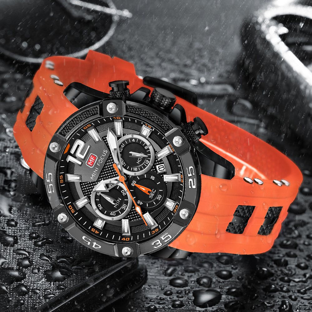 Eine schwarze Uhr mit orangefarbenem Armband. Die Uhr hat ein schwarzes Zifferblatt mit weißen und orangefarbenen Details.