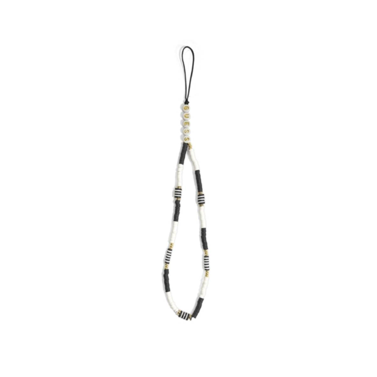 Un cinturino per telefono con perline nei colori nero, bianco e oro.