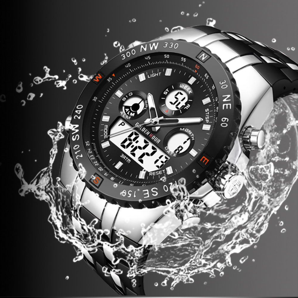 Eine schwarz-silberne Uhr mit Digitalanzeige, umgeben von Wasserspritzern.