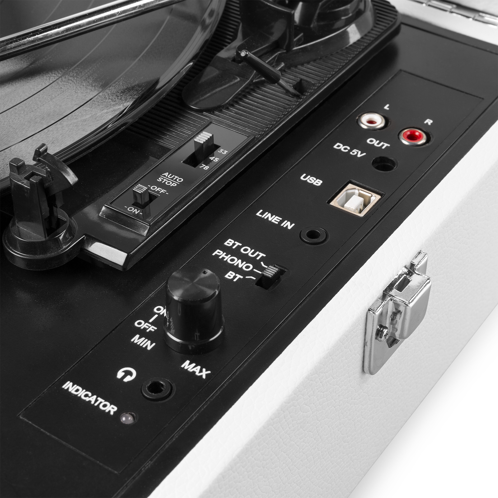 Close up of turntable controls. Includes on/off, volume, and speed controls. White base.