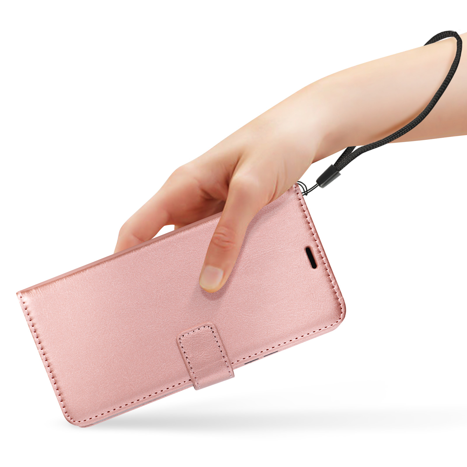 Una mano che tiene una custodia per telefono rosa con un cinturino da polso e una chiusura a bottone.