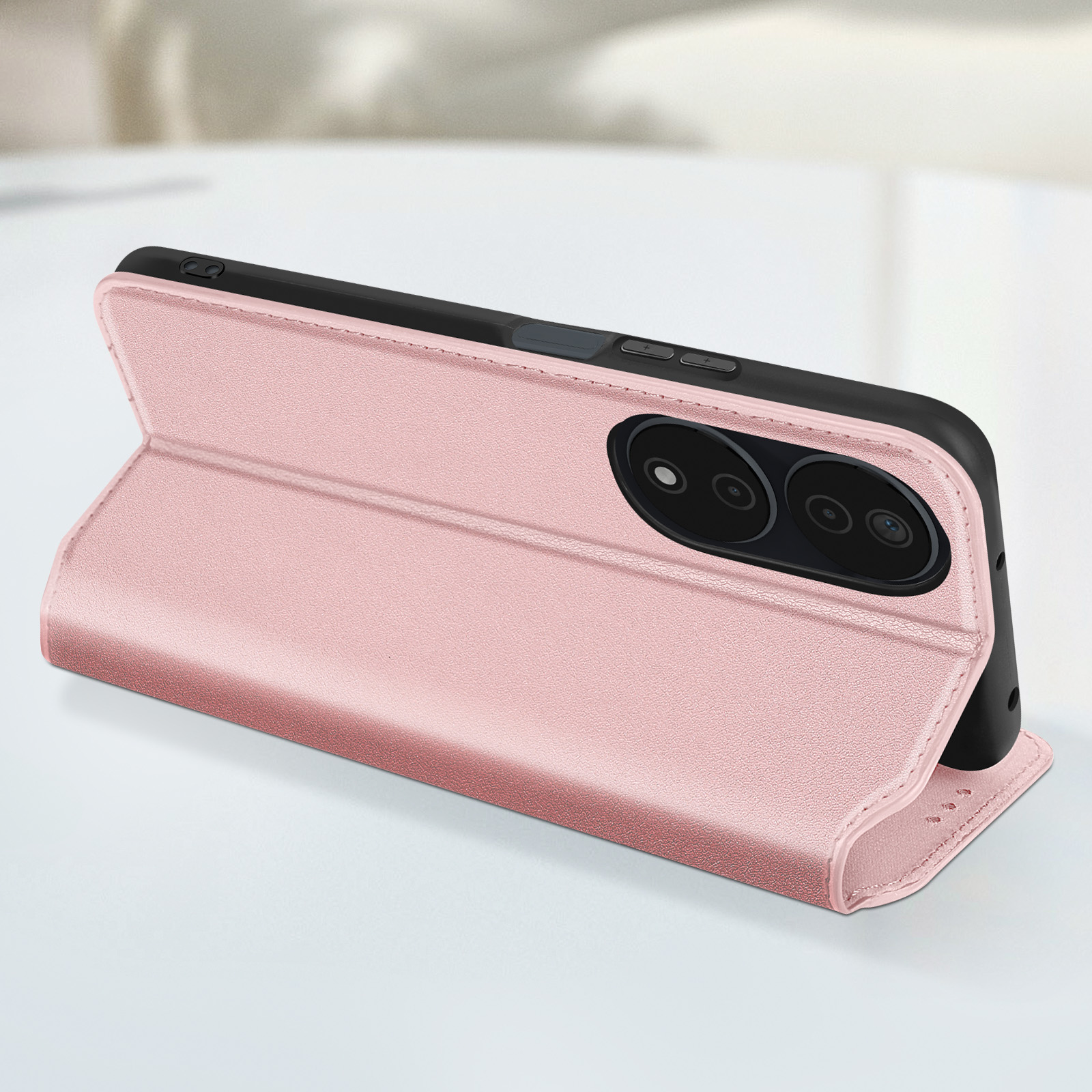 Custodia per telefono rosa con telefono visibile, in posizione verticale. Gli obiettivi della fotocamera sono visibili.