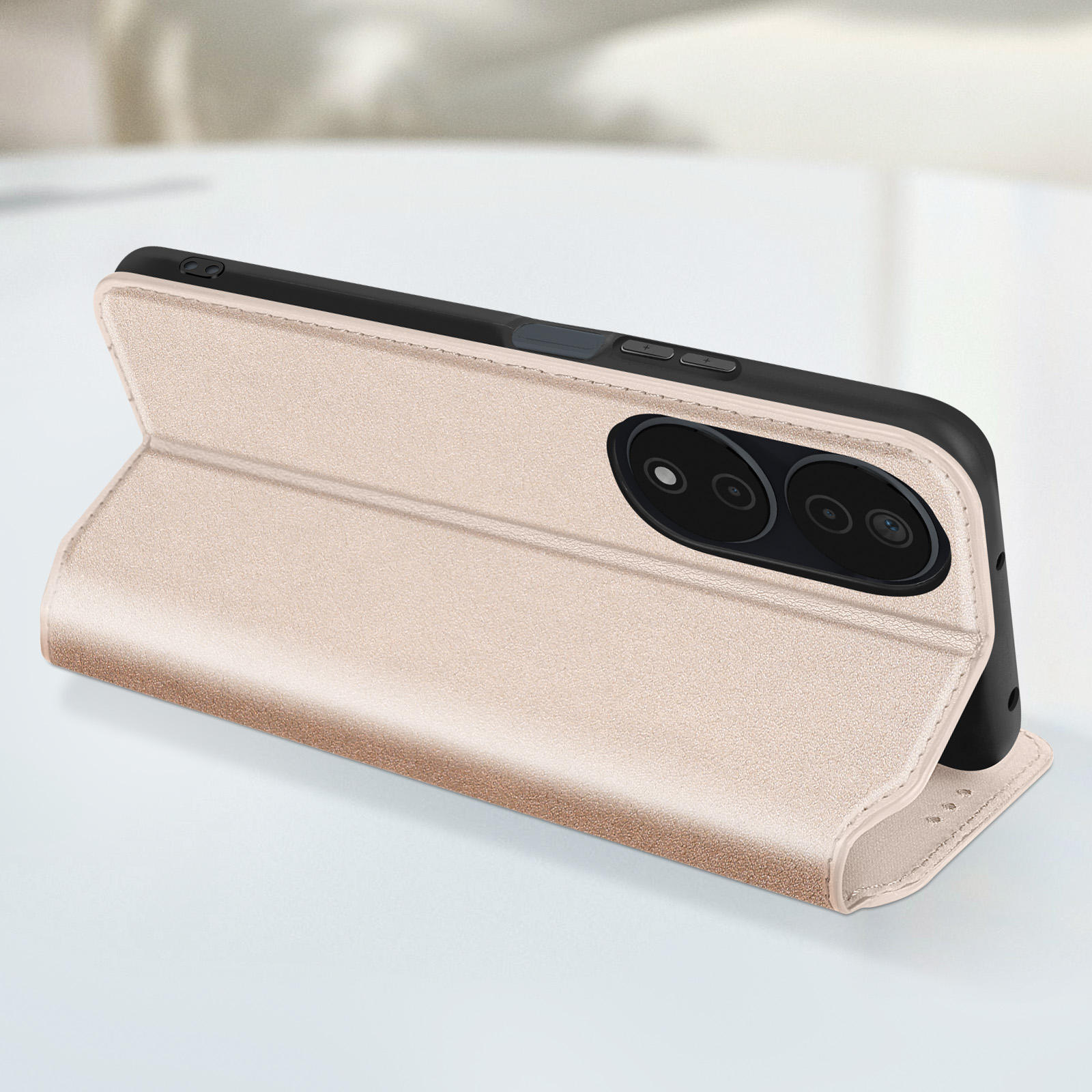 Custodia per telefono aperta, che rivela un telefono. Custodia di colore chiaro con finitura beige.