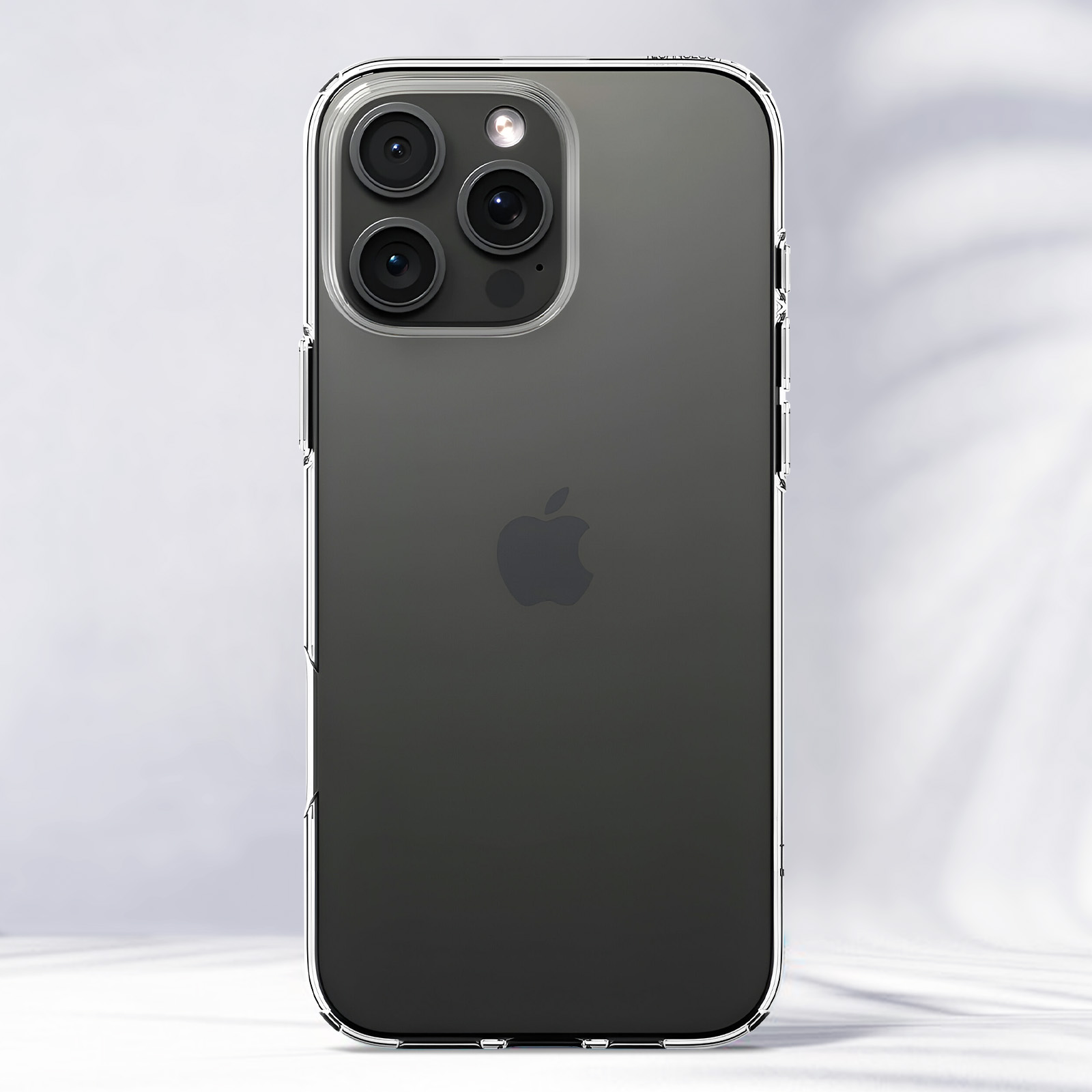 Custodia trasparente per telefono su un telefono, con design della fotocamera posteriore e logo Apple.