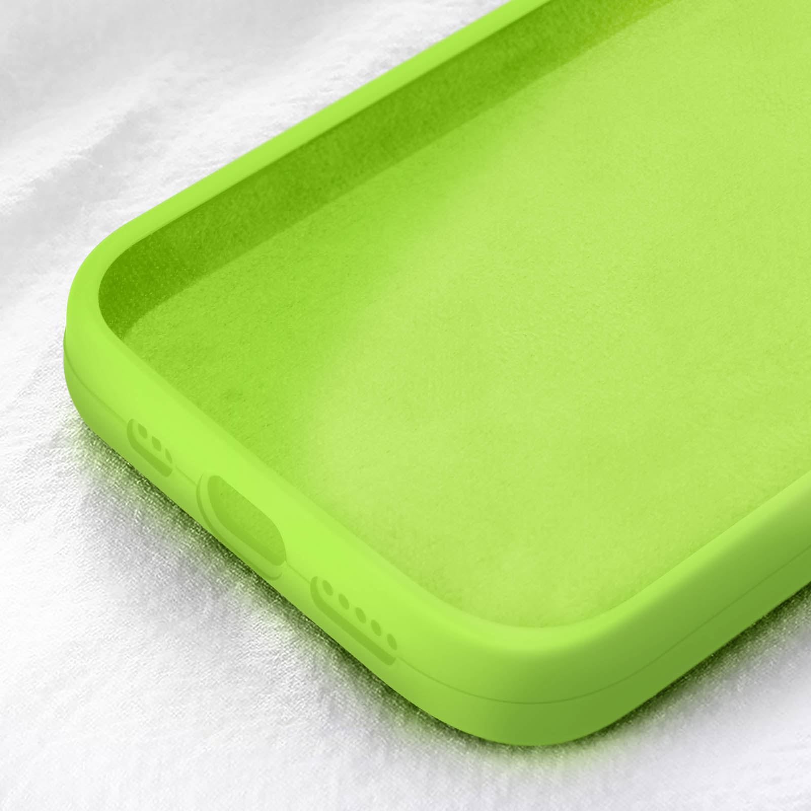Primo piano della custodia verde lime. Mostra il lato con fori per i pulsanti.