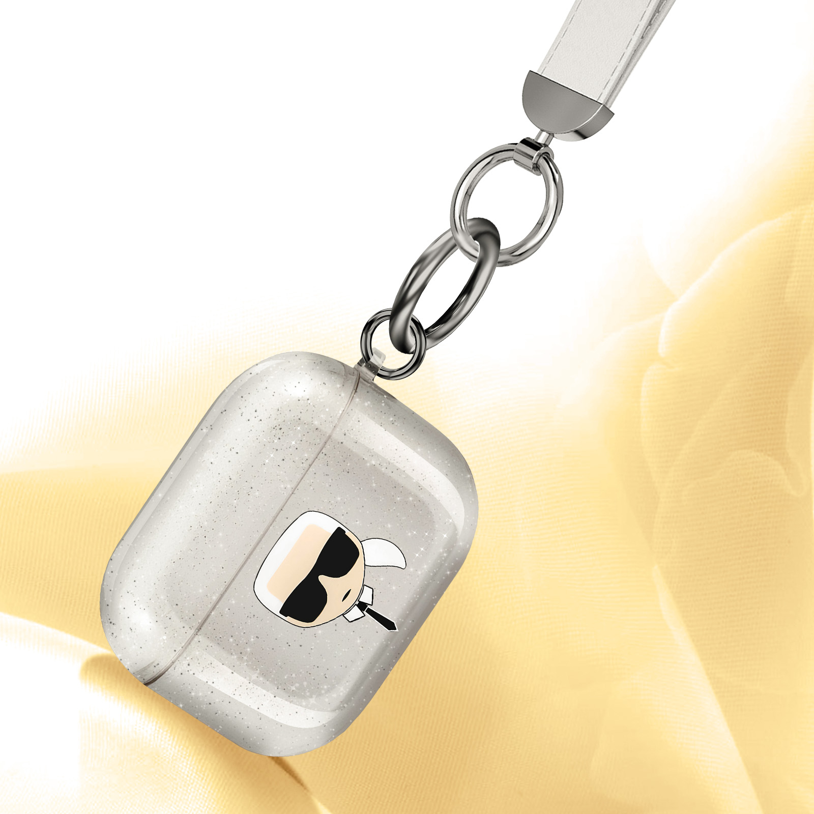 Funda Karl Lagerfeld AirPods con correa. Diseño Karl con purpurina.