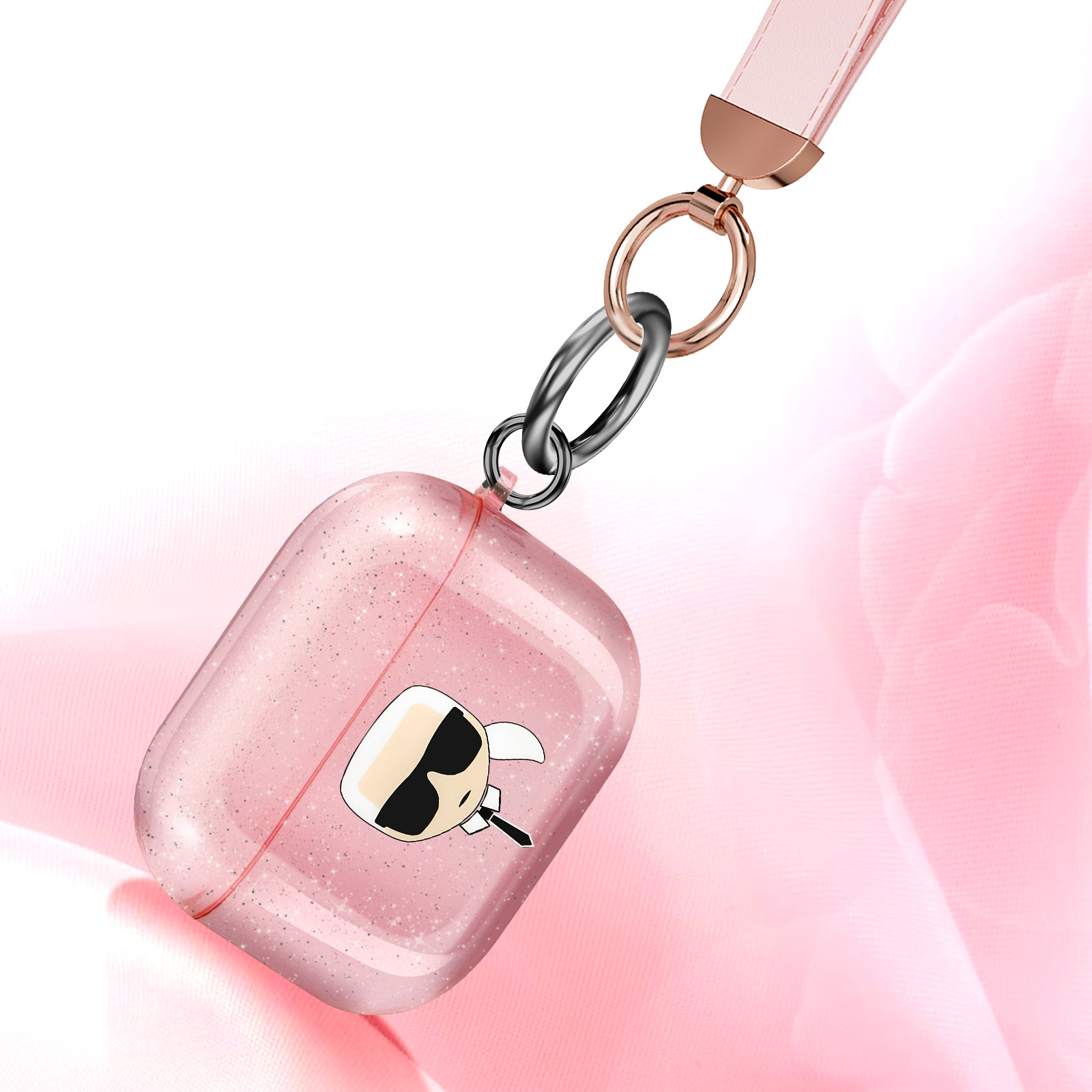 Funda rosa brillante para auriculares con diseño de Karl Lagerfeld y correa rosa. Fondo floral rosa.