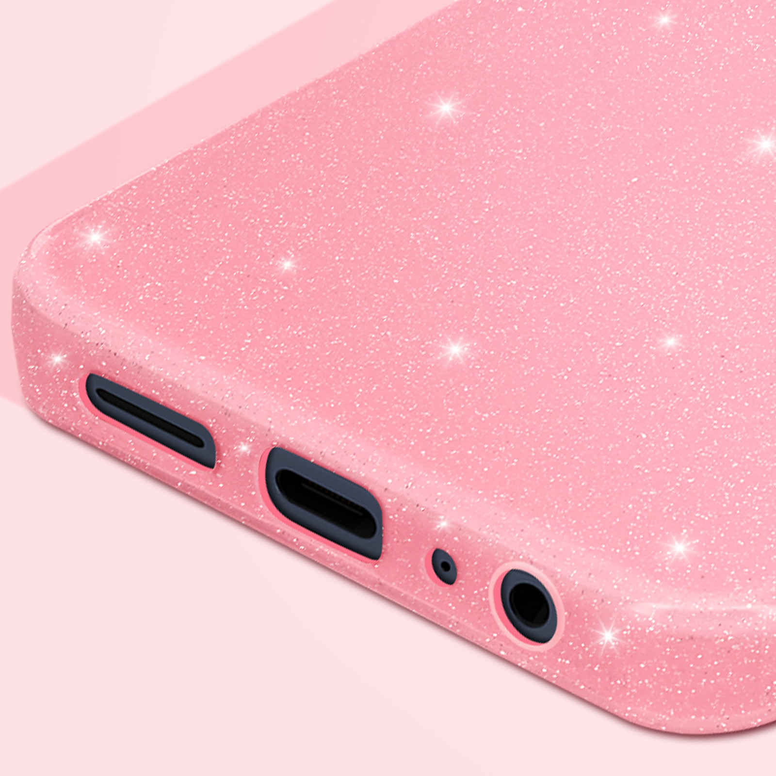 Primo piano di una custodia per telefono rosa scintillante. Mostra porte e una superficie liscia.