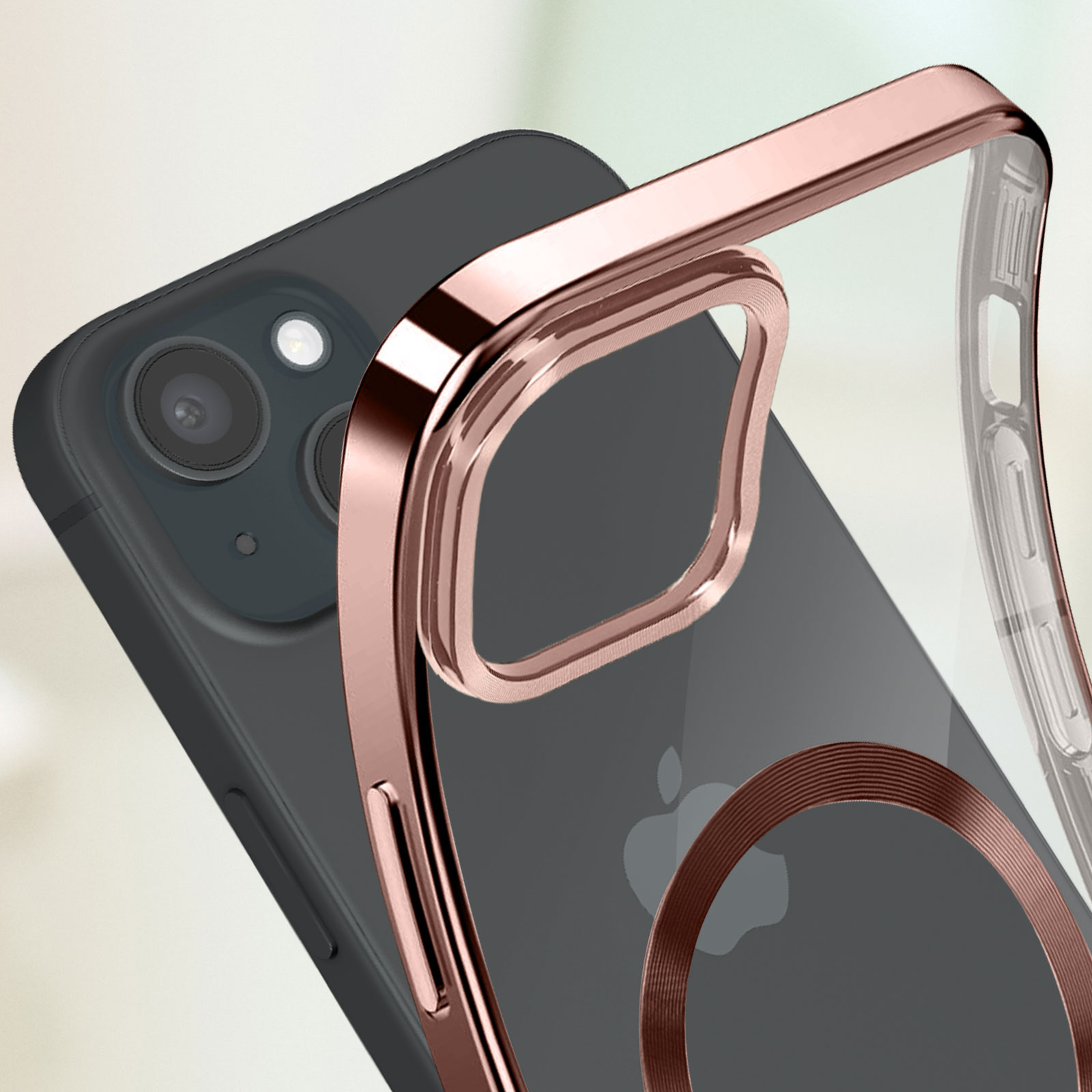 Un primo piano su un telefono con accenti oro rosa attorno alla fotocamera e un anello magnetico.