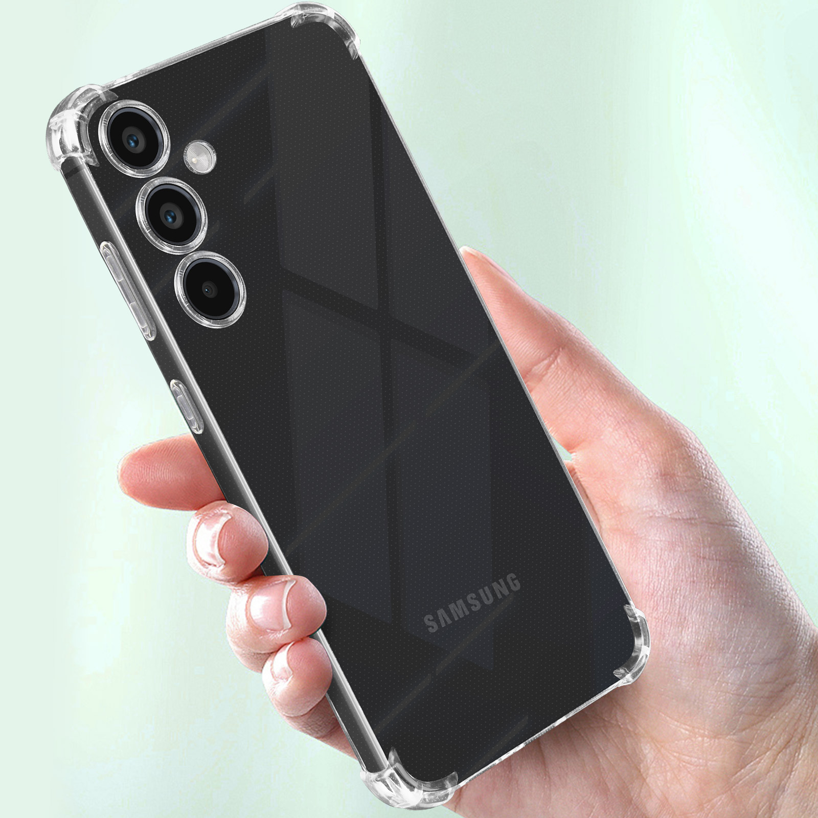 Custodia trasparente per telefono tenuta in mano, che mostra un telefono Samsung. Custodia trasparente con angoli protettivi.