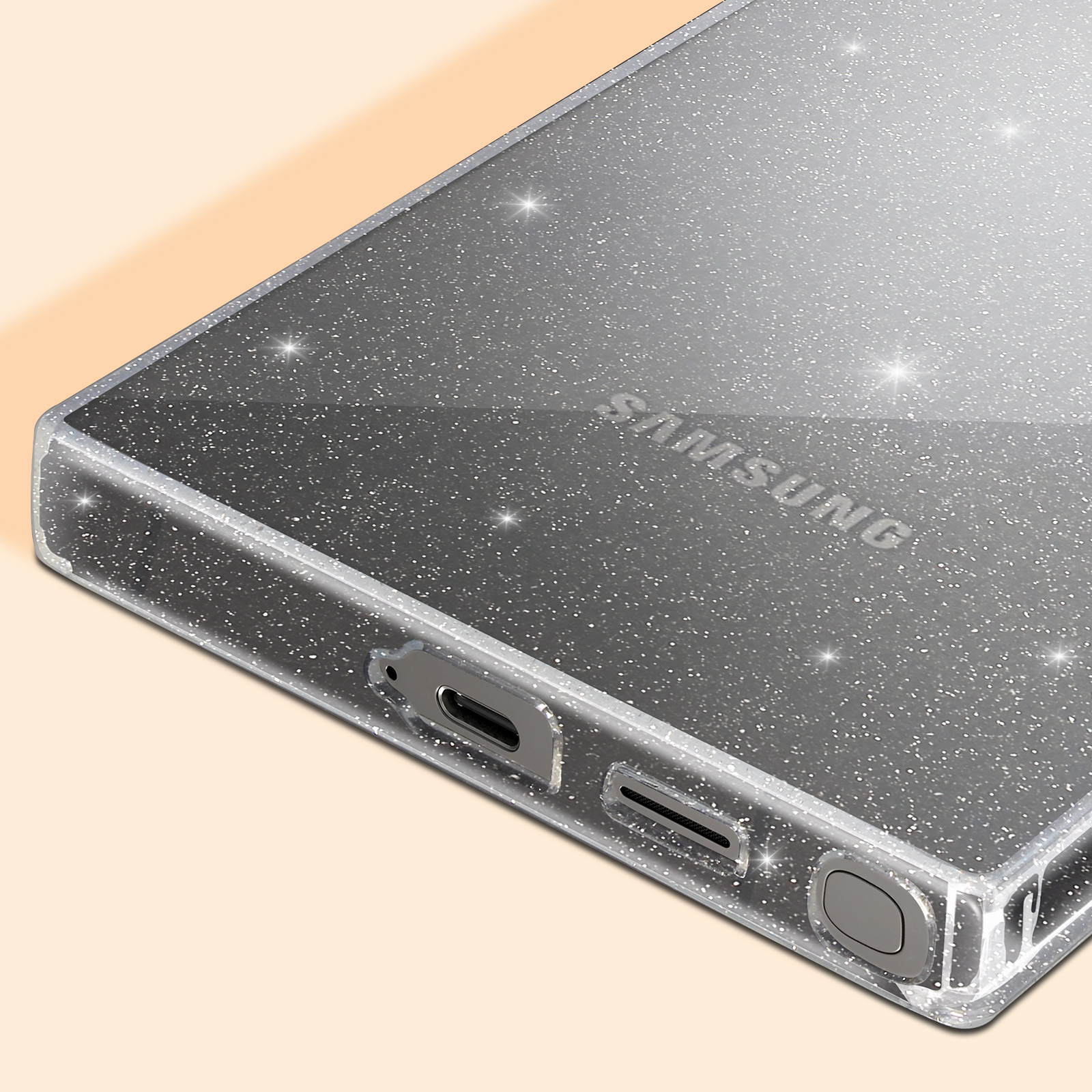 Primo piano di una custodia per telefono con superficie lucida e glitterata. La parola SAMSUNG è visibile.
